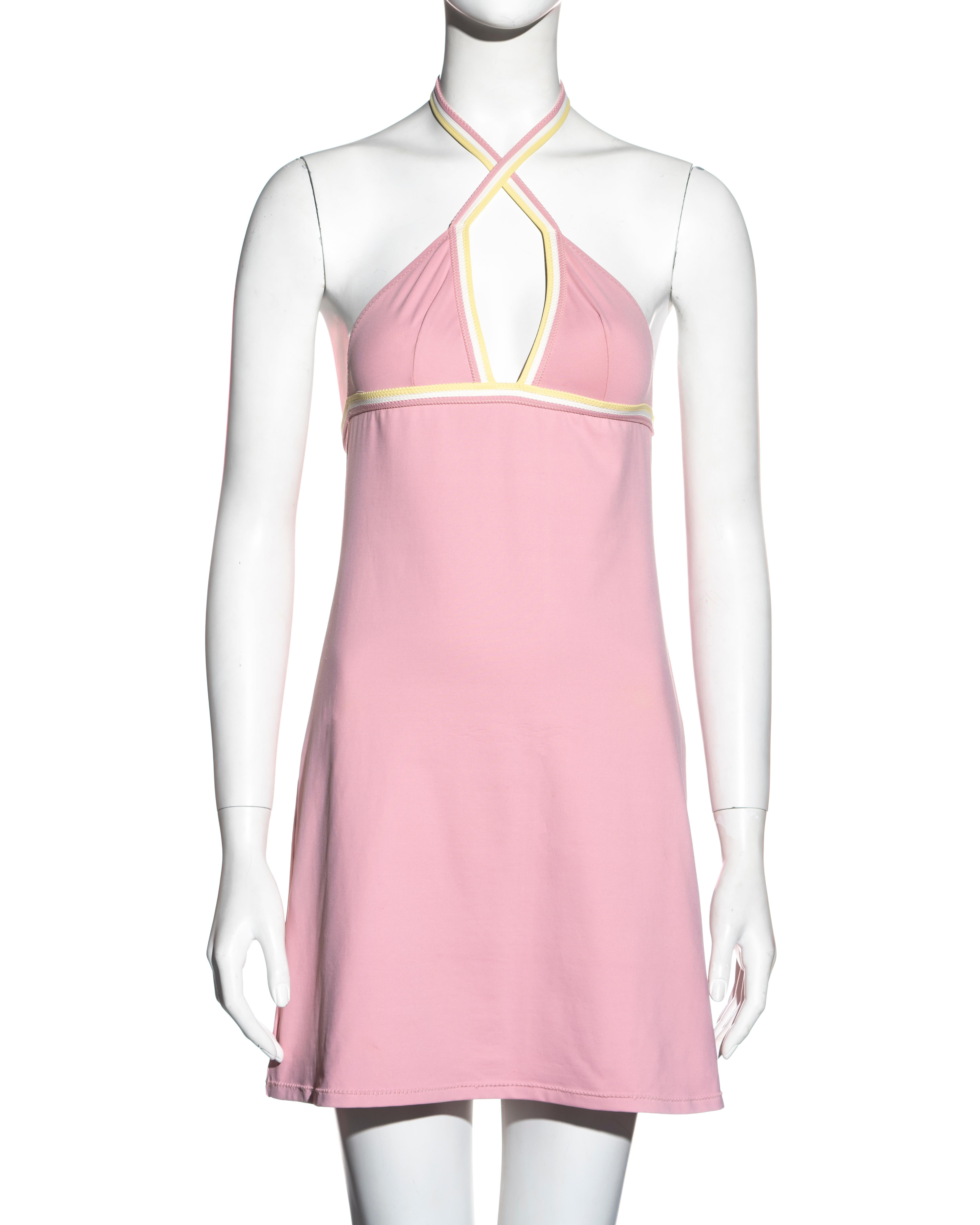 ▪ Chanel  baby pink nylon spandex mini dress
▪ Designed by Karl Lagerfeld 
▪ Halter neck can be styled in two ways 
▪ Lemon, pink, and white striped trim around the bust 
▪ Metal 'CC' logo clasp at the neck 
▪ FR 38 - UK 10 - US 6
▪ Cruise