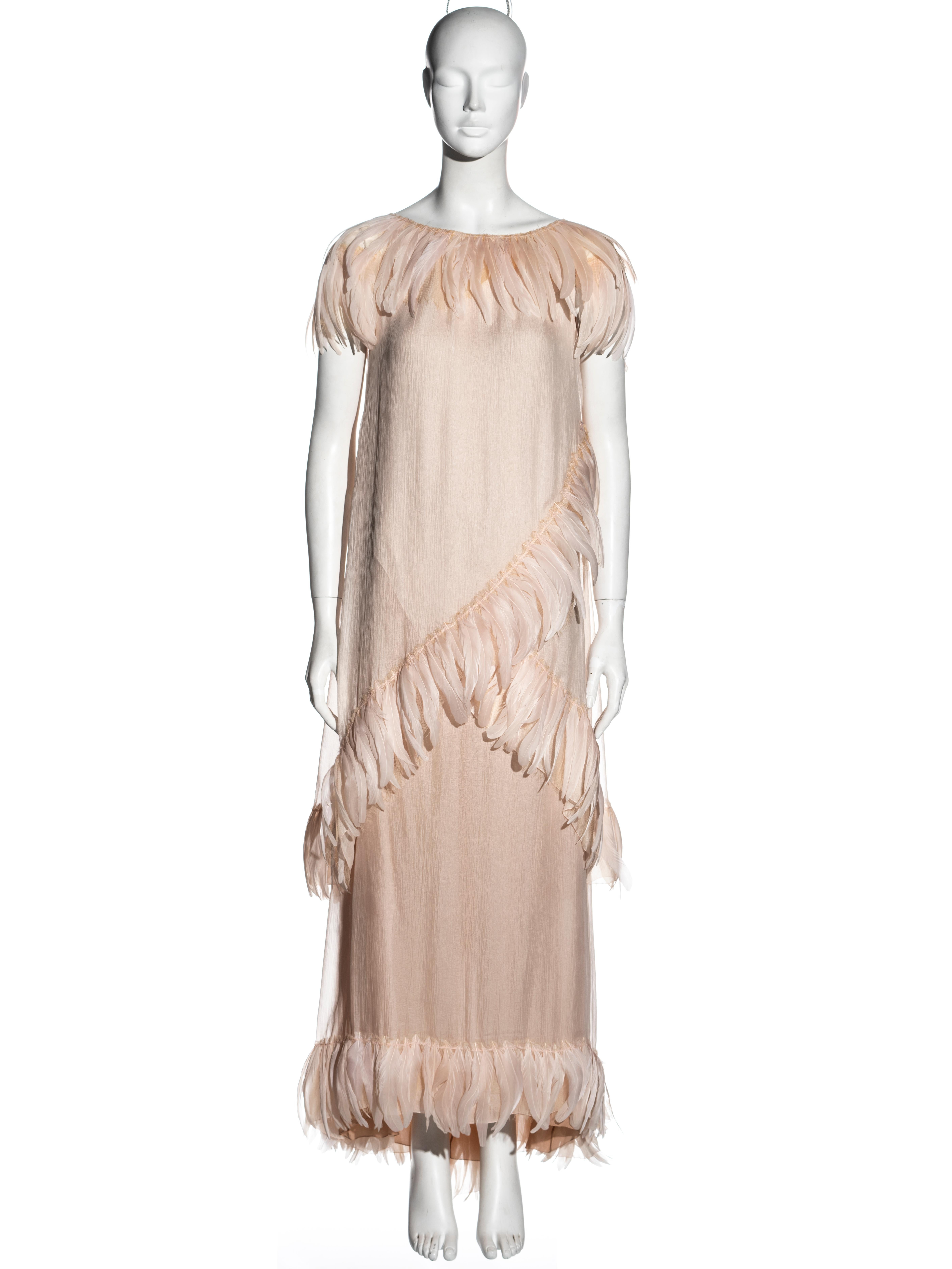 ▪ Chanel evening dress
▪ Designed by Karl Lagerfeld 
▪ Ivory silk chiffon 
▪ Rooster feather trim 
▪ Loose fit
▪ FR 36 - UK 8 - US 4
▪ Cruise 2009
▪ 100% Silk
▪ Made in France
