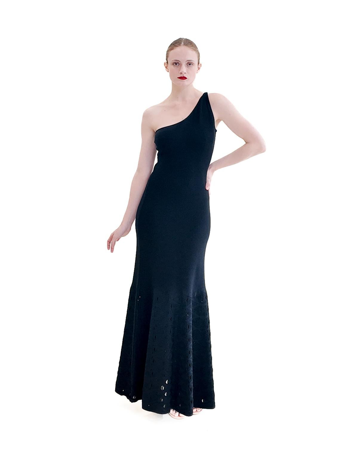 Experience effortless elegance with the Chanel by Karl Lagerfeld Spring 2012 Knit One Shoulder Gown. Its sophisticated design is perfect for a variety of occasions, while the stretchy and comfortable cutout knit fabric hem adds a touch of elegance.