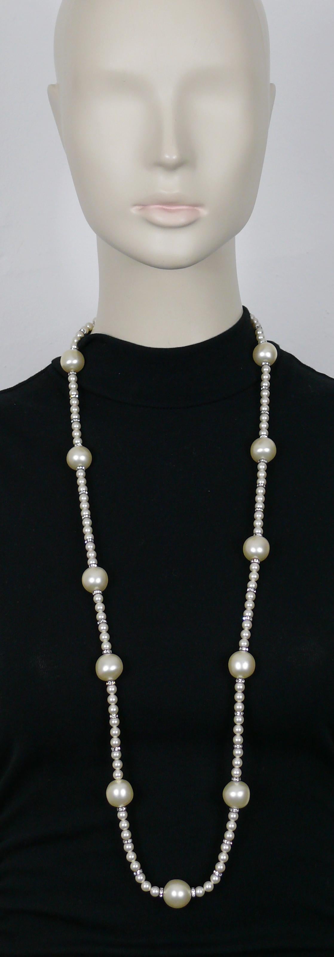 CHANEL by KARL LAGERFELD vintage faux pearl necklace with silver tone metal spacer rondels embellished with clear crystals.

Silver tone metal T-bar and quilted design toggle closure.

From the Fall 1993 Collection.
Jewelry artistic director