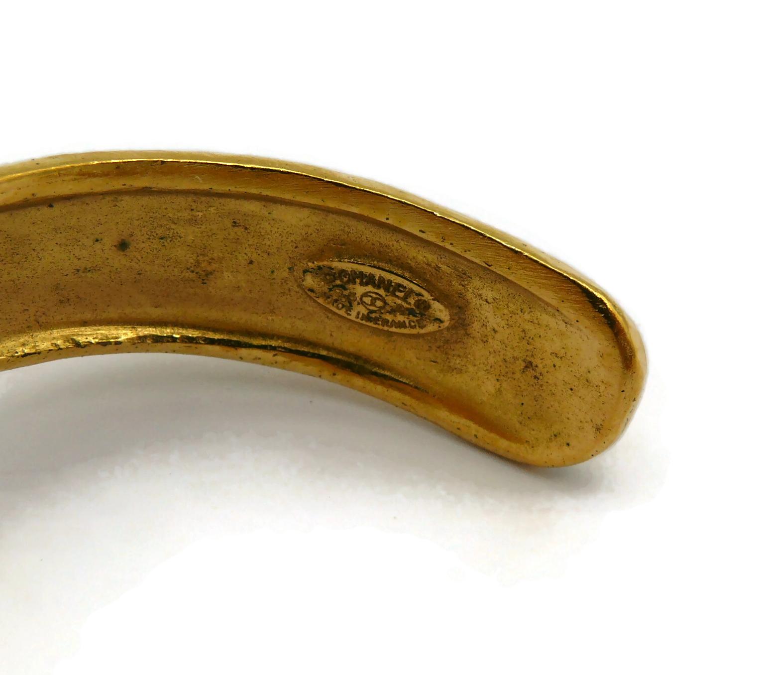 CHANEL by KARL LAGERFELD Vintage Gold Tone Blue Stone Bangle Bracelet, Fall 1996 For Sale 9