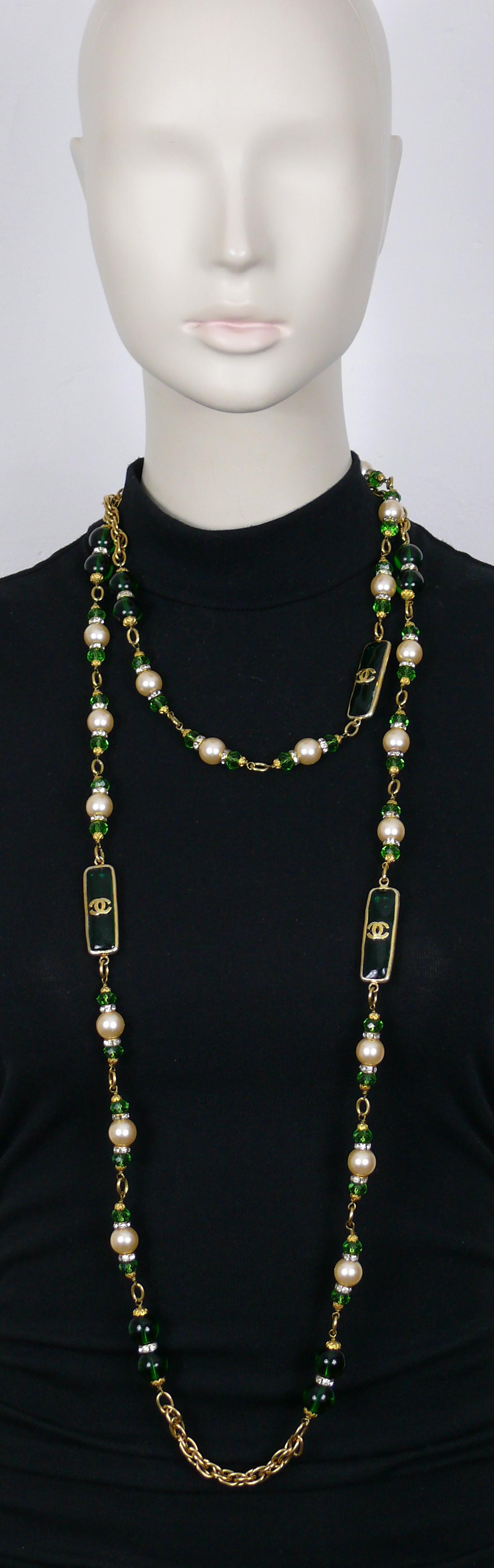 CHANEL by KARL LAGERFELD gorgeous vintage gold toned chain necklace featuring MAISON GRIPOIX green glass beads and rectangular links with CC logos, glass faux pearls, green facetted beads and clear crystal rondelles.

From the Fall 1993