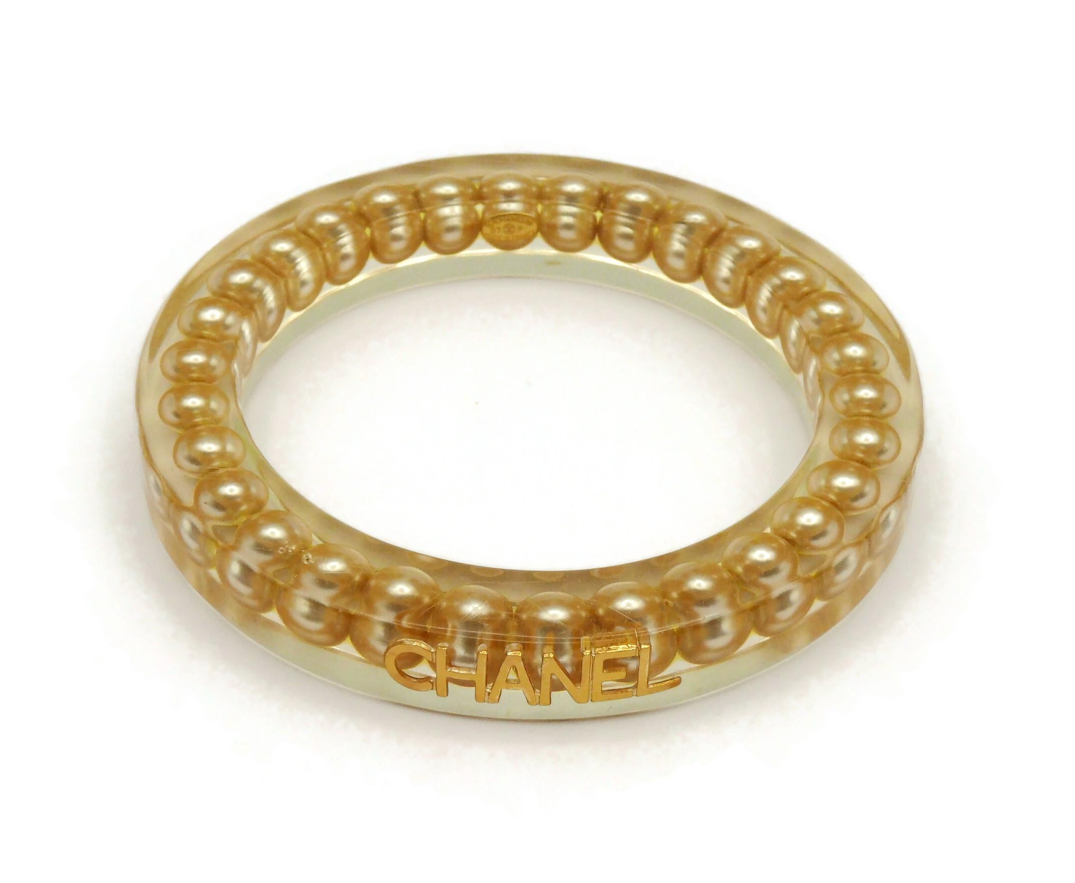 CHANEL by KARL LAGERFELD Vintage Lucite Pearl Inlaid Bangle, Spring 1997 In Good Condition For Sale In Nice, FR