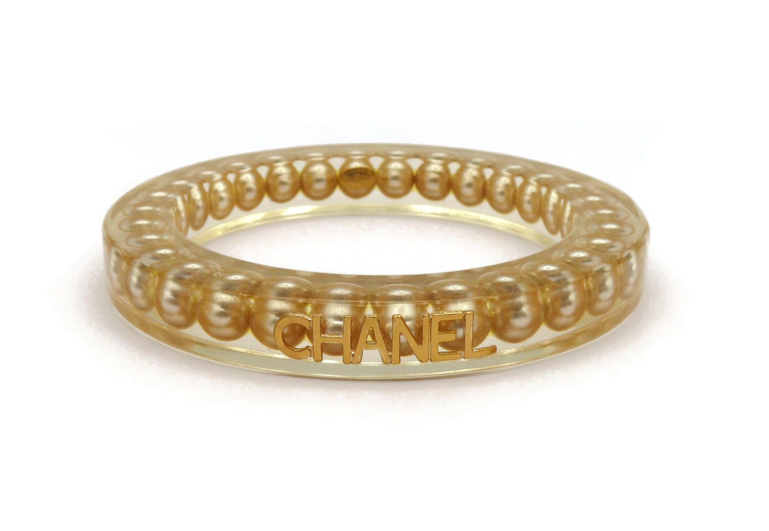 Women's CHANEL by KARL LAGERFELD Vintage Lucite Pearl Inlaid Bangle, Spring 1997 For Sale