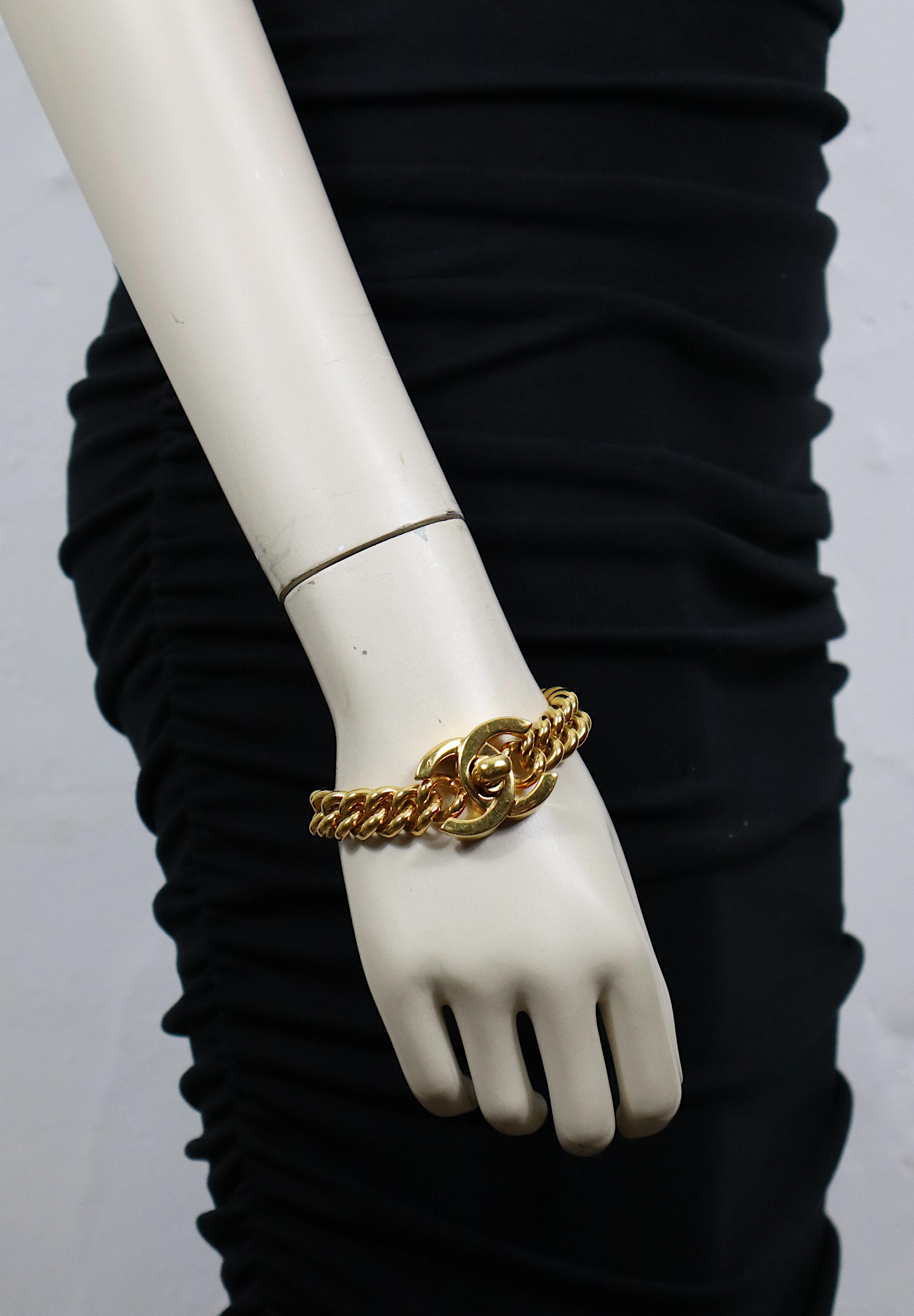 CHANEL by KARL LAGERFELD vintage gold tone chain bracelet featuring an iconic turn-lock clasp.

Spring 1996 Collection.

Embossed CHANEL 96 P Made in France.
Private sale 
