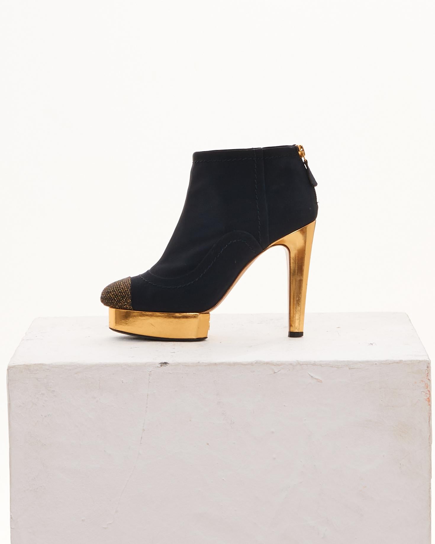 - Designed by Karl Lagerfield
 -Sold by Skof.Archive
- Early 00's
- Black and gold ankle platform heeled boots
- Black Suede
- Gold point
- Gold platform and heel
- Knitted details
- Made in Italy
- Excellent condition
- Materials: Leather
- Size:
