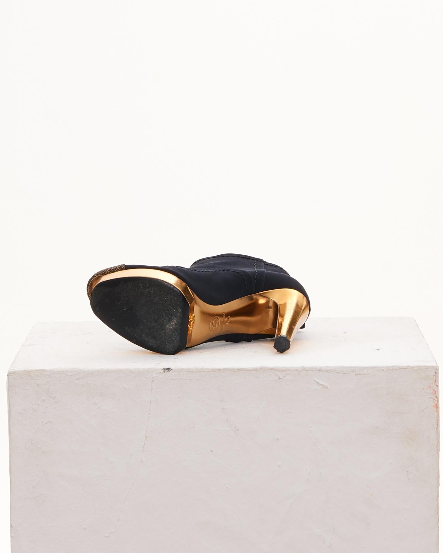 Women's Chanel by Karl Lagerfield Black and gold ankle platform heeled boots For Sale