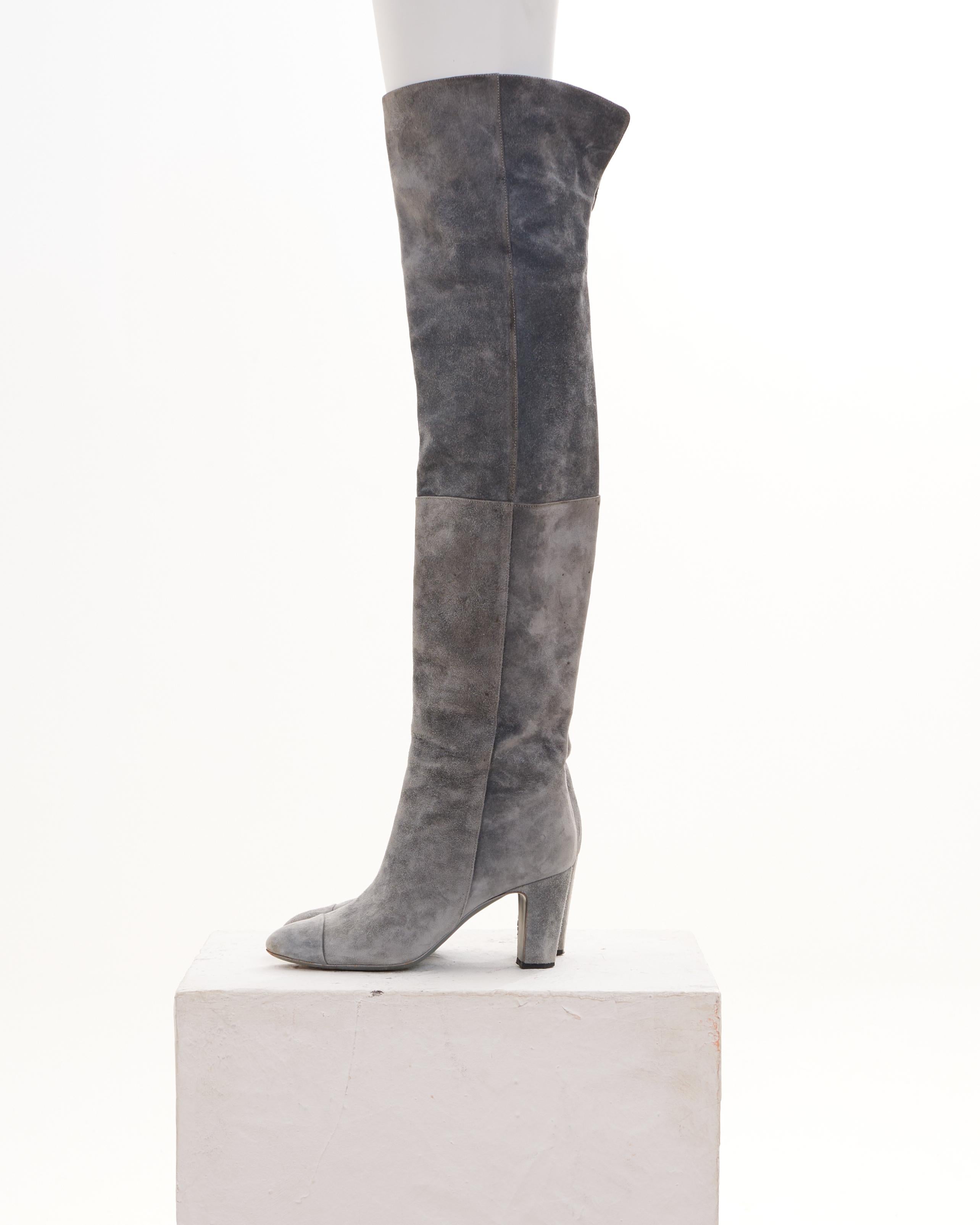 - Designed by Karl Lagerfield
- Sold by Skof.Archive
- Late 00's
- Suede Brown Boots
- High Heels
- 