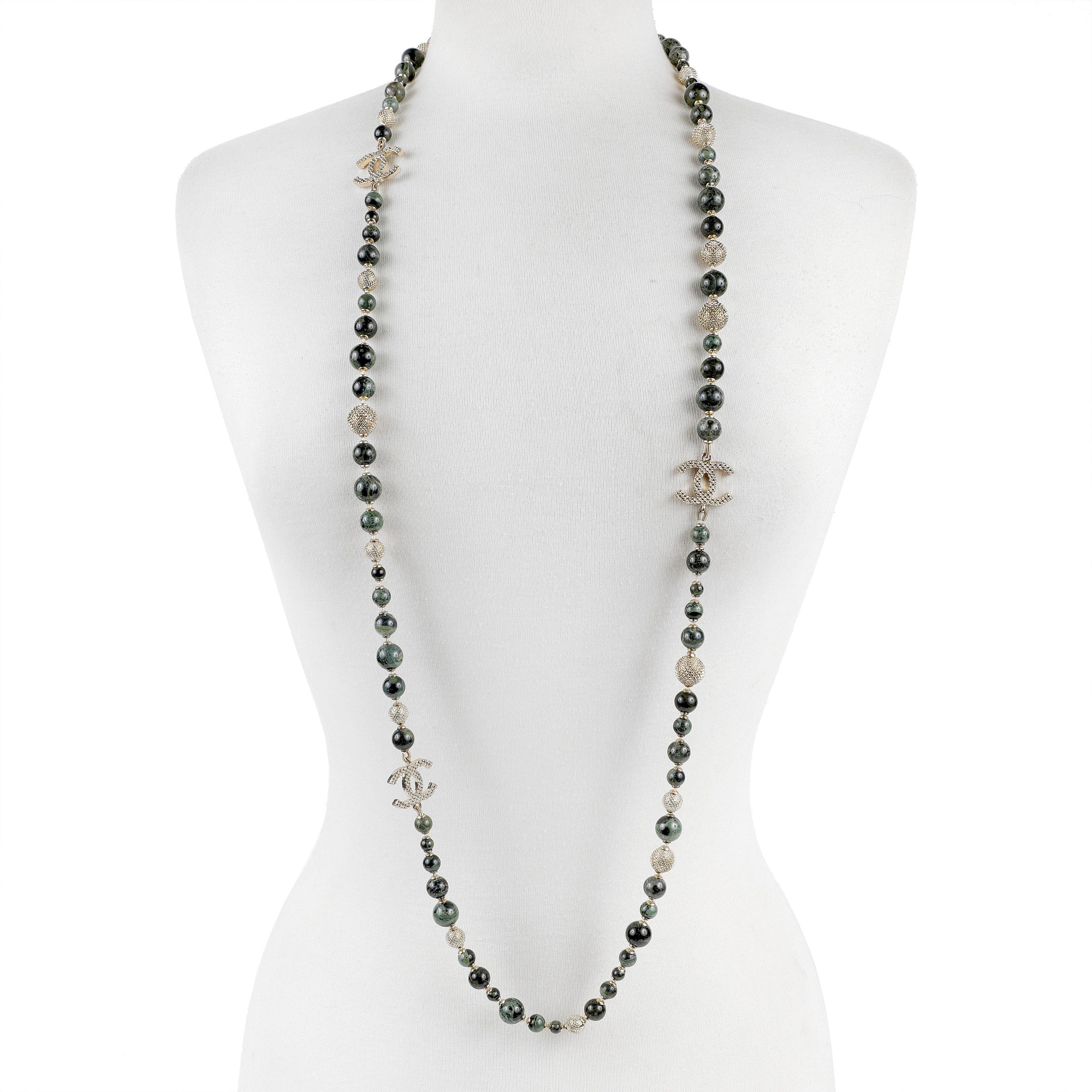 This authentic Chanel Onyx Bead CC Necklace is in pristine condition.  From the Byzantine Collection, it may be worn single or double.  Polished dark onyx stones interspersed with quilted beads and interlocking CC’s.  Adjustable length. 

PBF 12551
