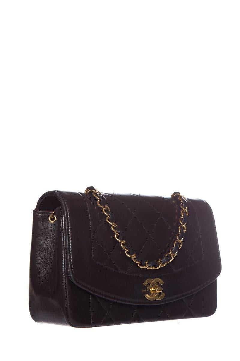 Chanel Medium Diana Flap bag with gold-tone hardware, dual chain-link and leather shoulder strap, single exterior slit pocket, burgundy leather lining, dual interior pockets; one with zip closure and CC turn-lock closure at front flap.