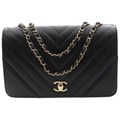 Chanel Calfskin Black Chevron Gold Tone Metal Medium Flap Bag A91588