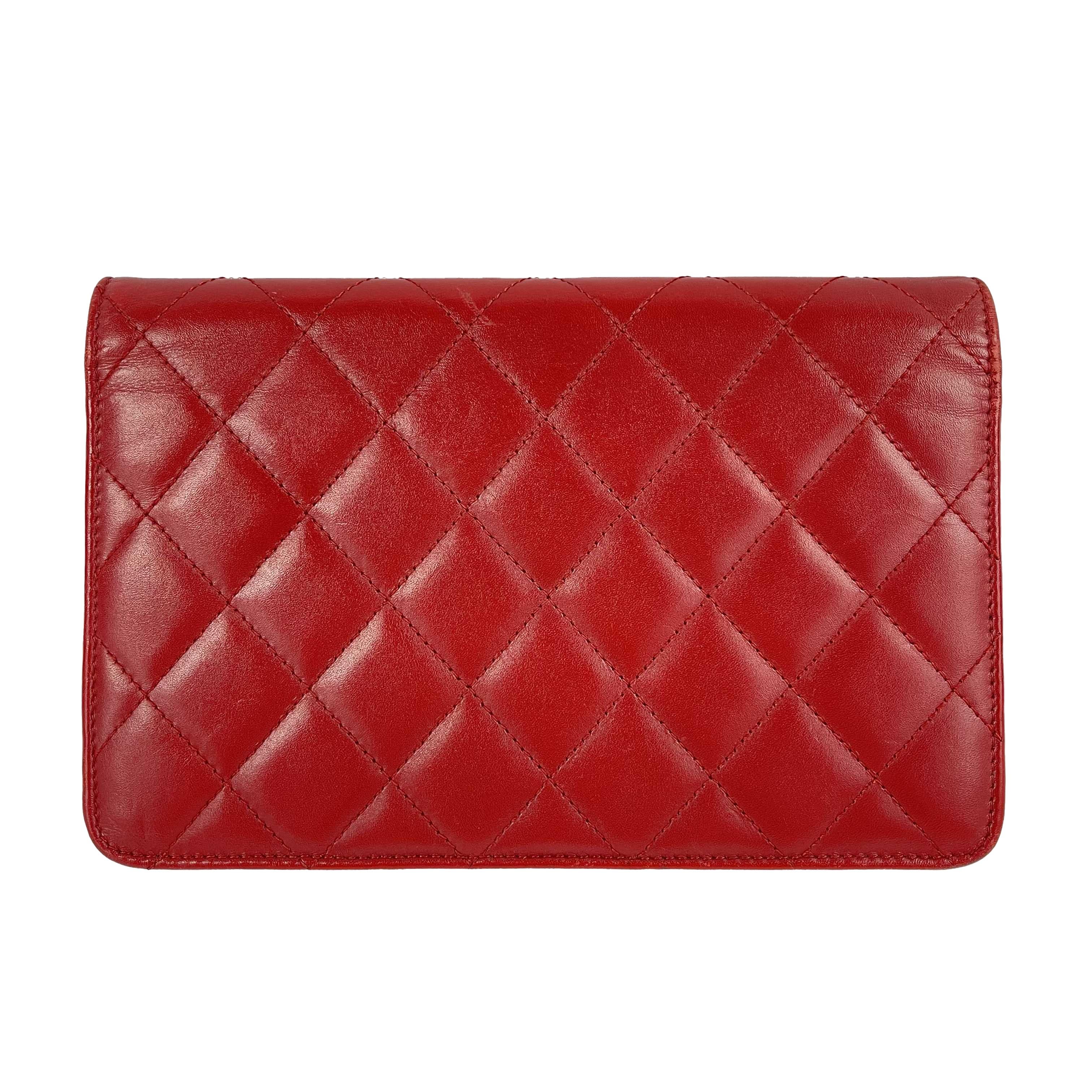 CHANEL - Calfskin Quilted Cambon Red / Silver Wallet On Chain - Crossbody

Description

From the 2010 Collection.
This wallet on chain is beautifully crafted of smooth red leather with a red patent leather Chanel CC logo patch. The wallet opens with