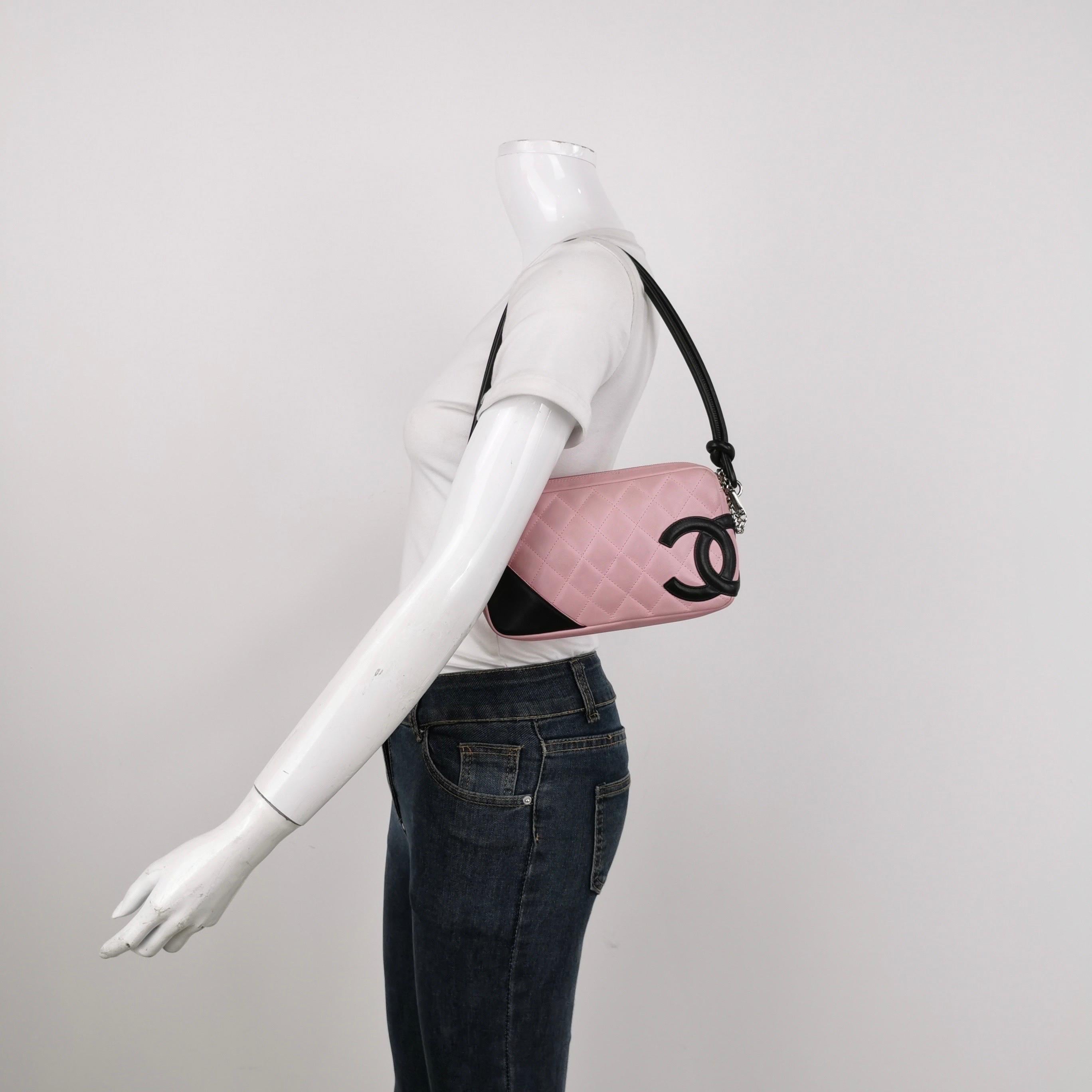 Named after the Cambon street in Paris the Chanel store is located. 

CONDITION: VERY GOOD

This preloved / preowned Chanel cambon clutch bag is in very good condition. Rubbing around the corners. Scratches to the hardware. Light stains on the body