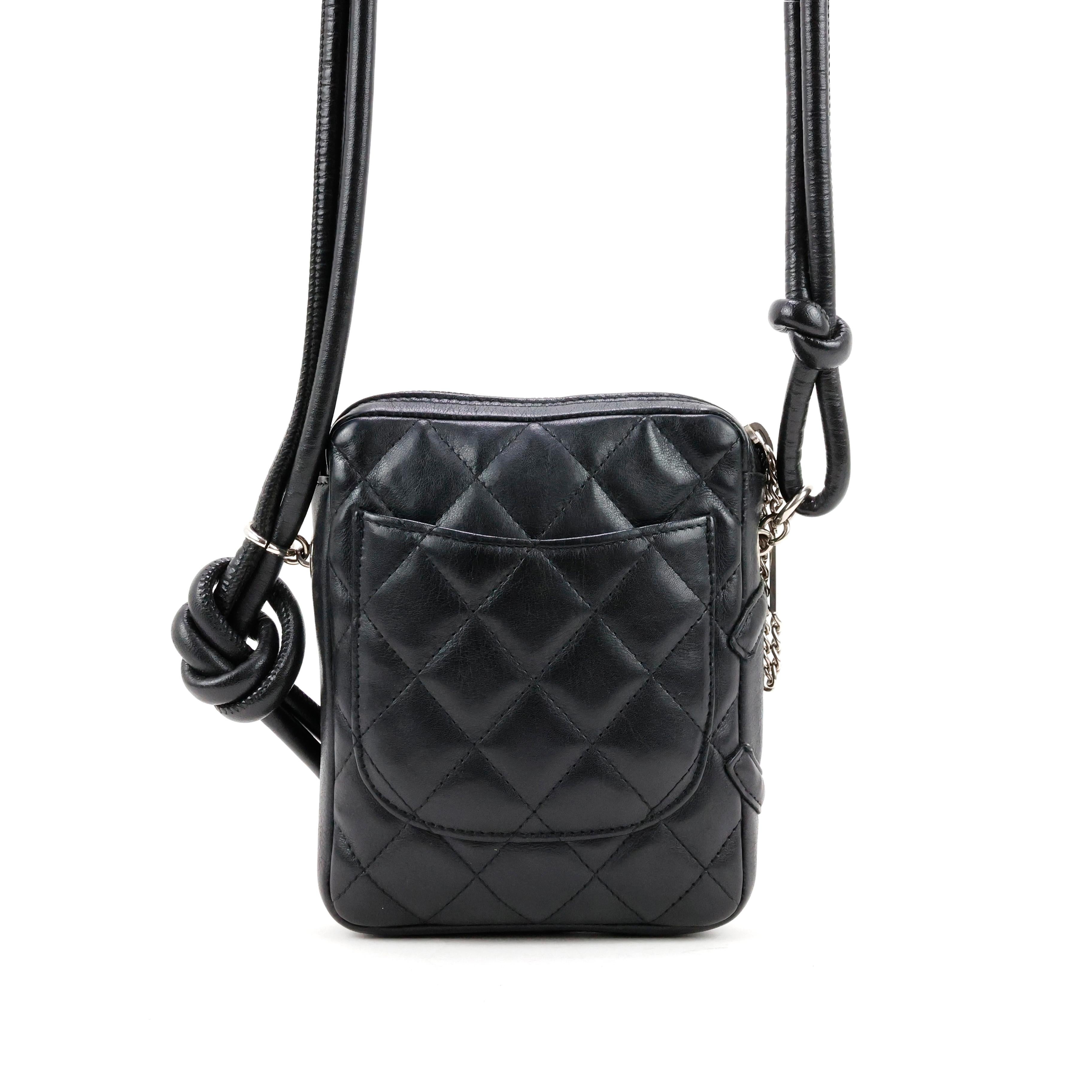Chanel bag -  Chanel Cambon crossbody bag in leather, color black, silver hardware.

Condition:
Good/really good. Externally is in really good, internally there are some unstitched parts.

Packing/accessories:
Dustbag and box.

Measurements:
13,5cm