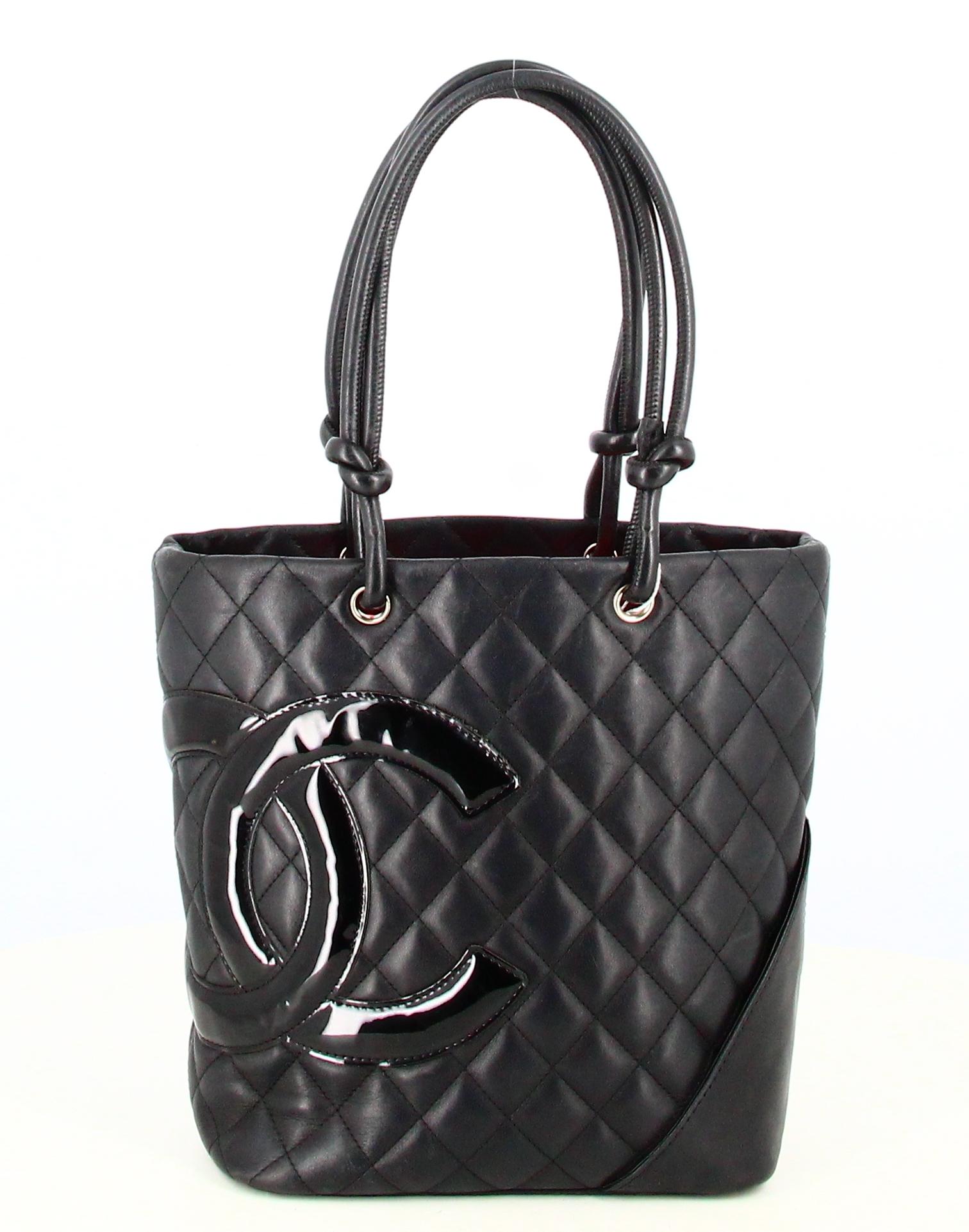 Chanel Cambon Handbag Black Quilted Leather

- Good condition. Slight traces of wear over time.
- Chanel Cambon Handbag
- Black quilted leather
- Chanel double C logo 
- Inside: pink double C logo lining 
- Two black leather straps 
