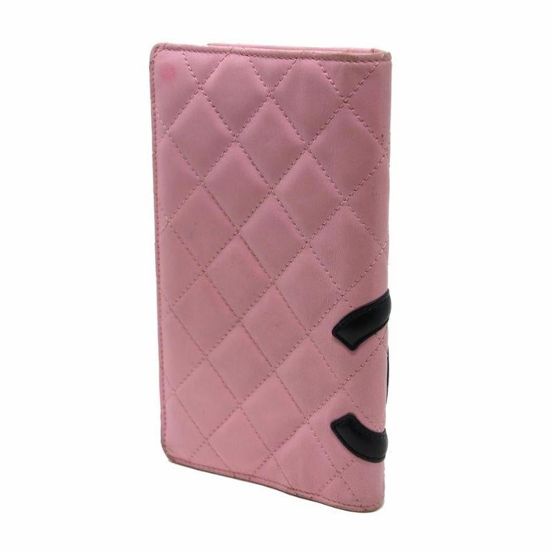 Chanel Cambon Long Lambskin Wallet CC-1104p-0002

Pink quilted leather Chanel Ligne Cambon Yen wallet with black accents and silver polished hardware, tonal patent leather interlocking CC applique at front face, pink leather lining, three interior