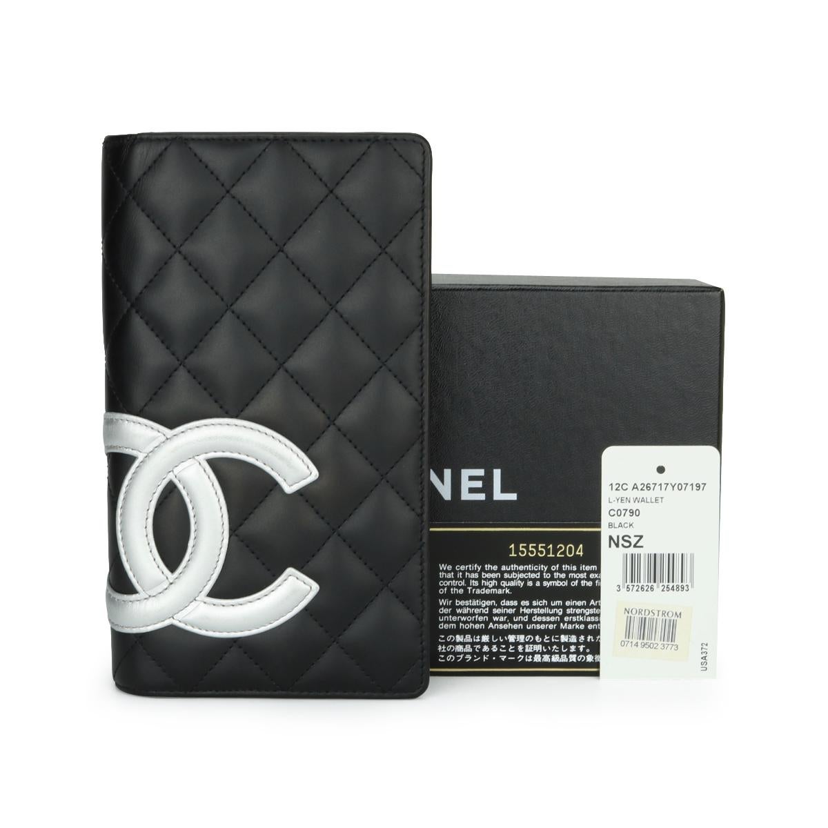 CHANEL Quilted Cambon Long Wallet Black and Silver Calfskin with Silver Hardware 2012.

This stunning Cambon wallet is in very good condition, the wallet still holds its original shape, and the hardware is still very shiny.

- Exterior Condition: