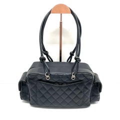 Chanel Cambon Multi-pocket Ligne Reporter Bag Medium Black Calfskin Leather