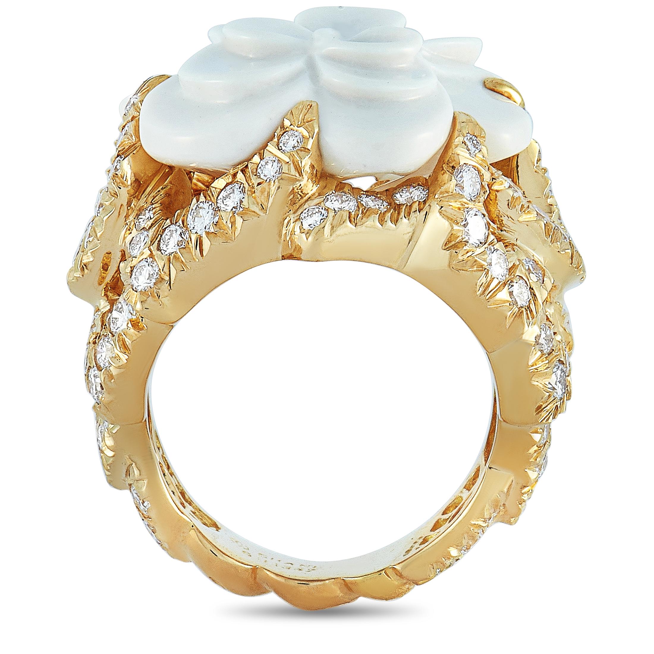 The Chanel “Camélia” ring is made out of 18K yellow gold and ceramic and weighs 21.7 grams. It is embellished with diamonds that feature grade F color and VS1 clarity and amount to approximately 3.00 carats. The ring boasts band thickness of 4 mm