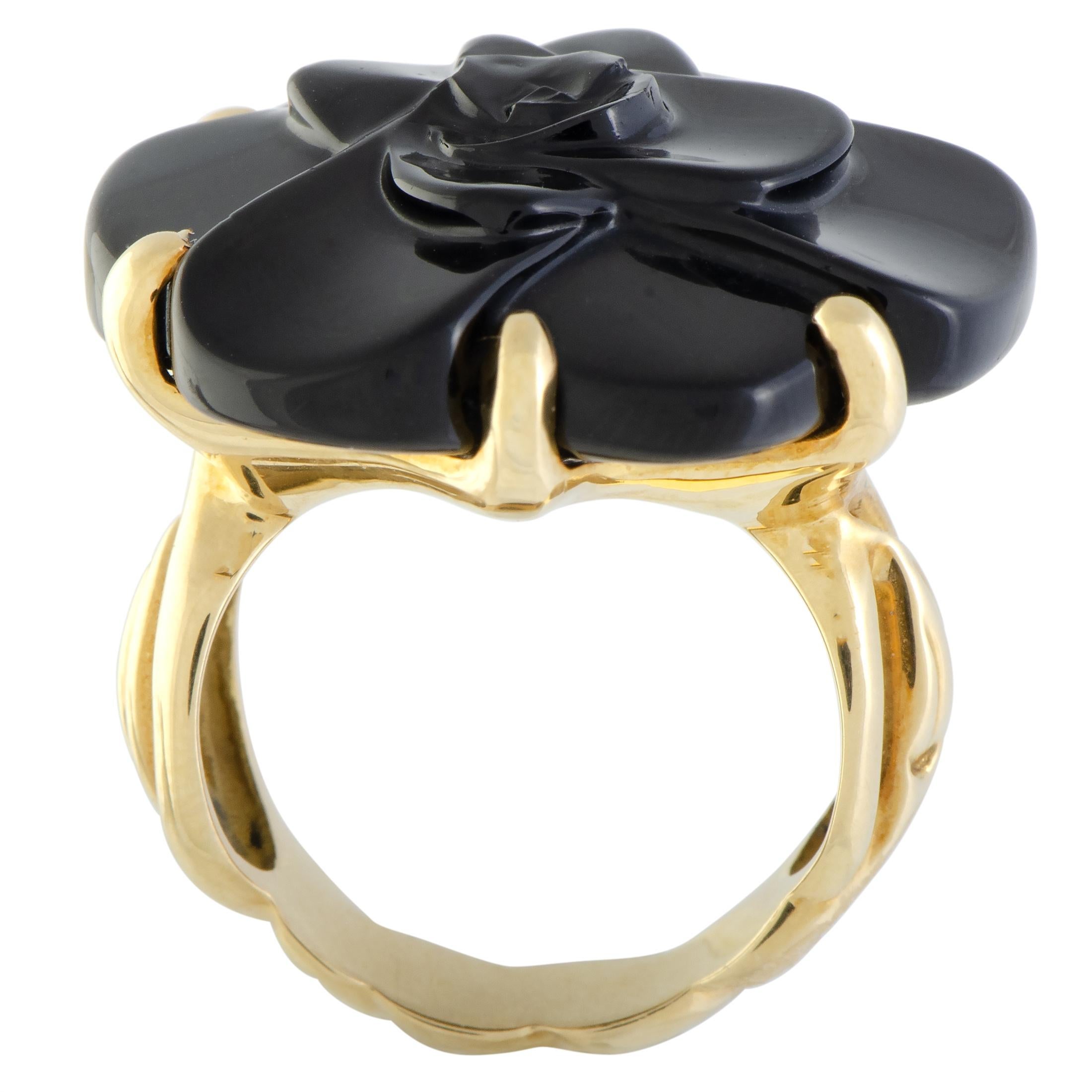 One of the brand’s most iconic and enticing hallmarks, the eternally graceful camellia motif is presented in captivating onyx in this brilliantly designed and exquisitely crafted 18K yellow gold ring from Chanel which exudes gentle femininity and