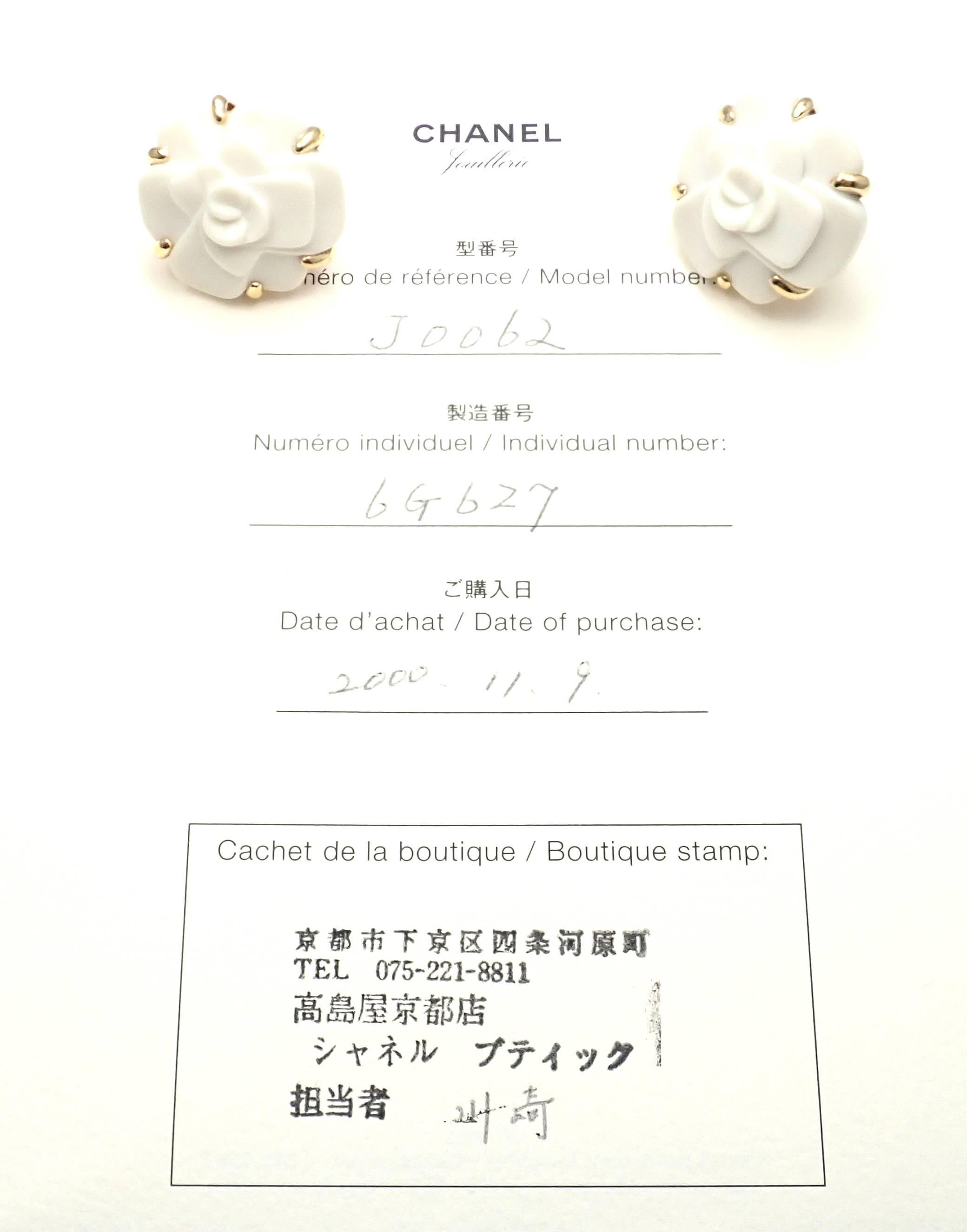 18k Yellow Gold White Agate Camellia Camelia Flower Earrings by Chanel. 
With 2 white agate flower stones.
There earrings come with paper from Chanel.
These earrings are made for pierced ears.
Details: 
Measurements: 26mm
Weight:  24.7 grams
Stamped
