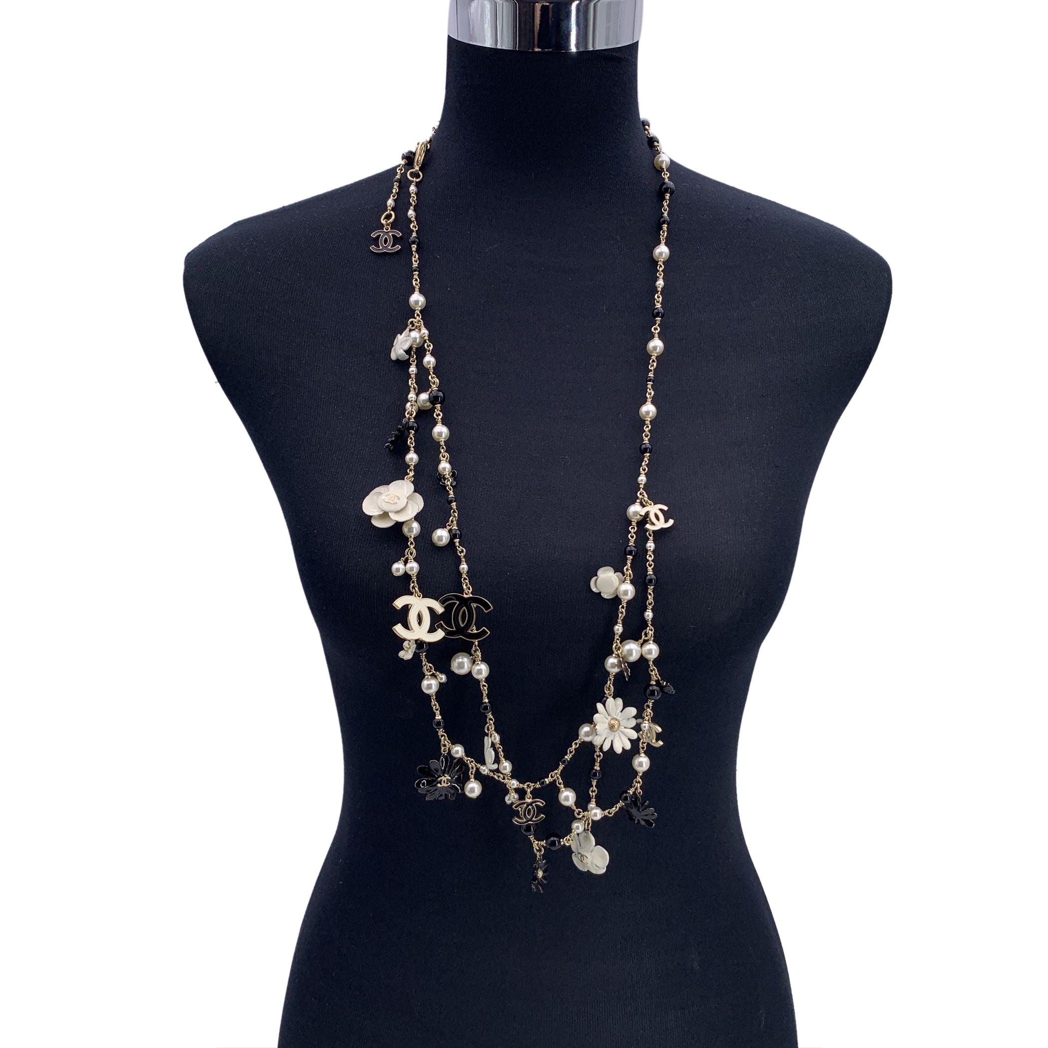 Chanel Camelia Flowers and CC Logos Long Multi Strand Necklace In Excellent Condition In Rome, Rome