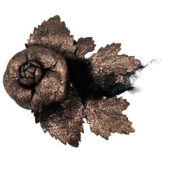 CHANEL Camellia Brooch in Moiré Leather