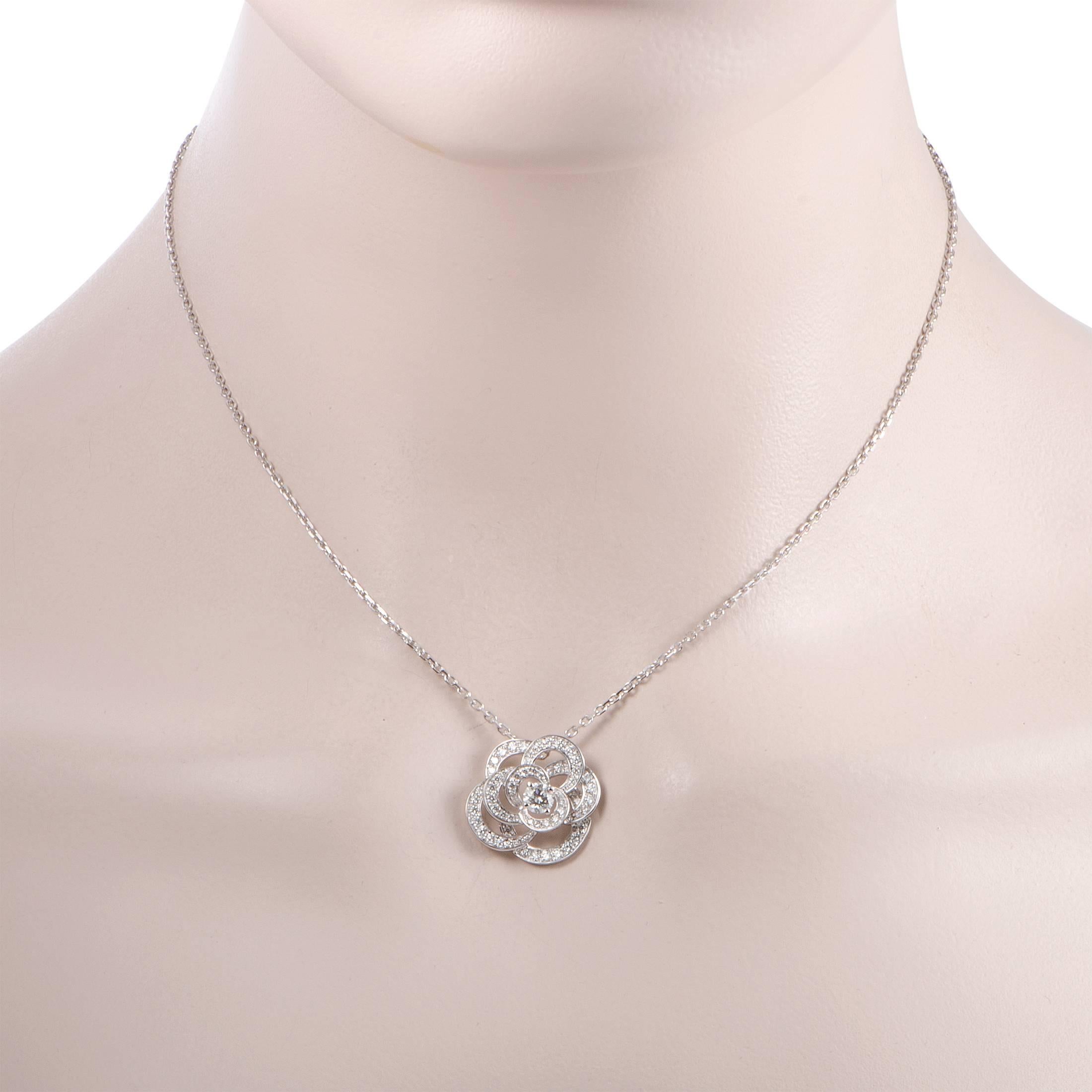 Chanel’s iconic camellia motif is gorgeously presented in elegant 18K white gold in this sublime necklace that boasts an incredibly feminine appeal. The pendant is set with 0.67 carats of diamonds that accompany the center diamond stone of F color