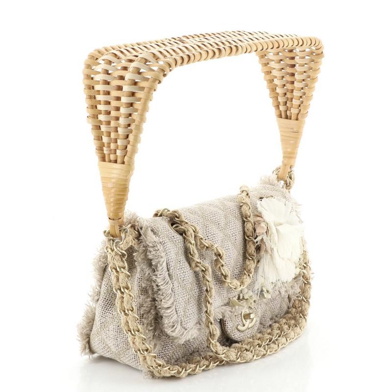 Condition: Great. Light fraying on base, curling on front embellishment, small glue stains along opening edge and underneath flap. Minor wear in interior, scratches on hardware.
Accessories: No Accessories
Measurements: Height 6.5