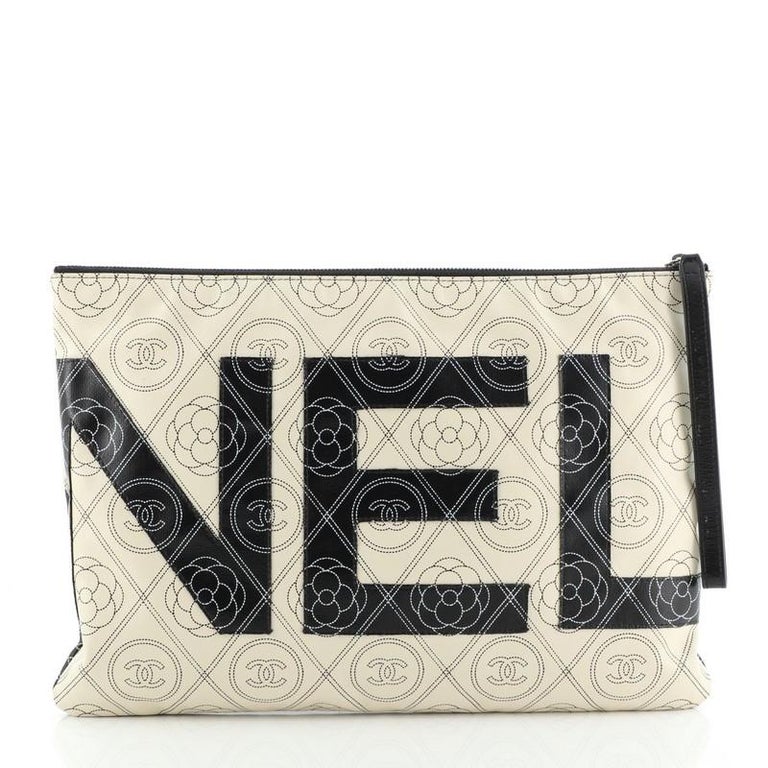 Chanel Camellia Logo Wristlet Clutch Printed Coated Canvas Large at 1stDibs  | camellia clutch, camelia clutch, chanel canvas clutch