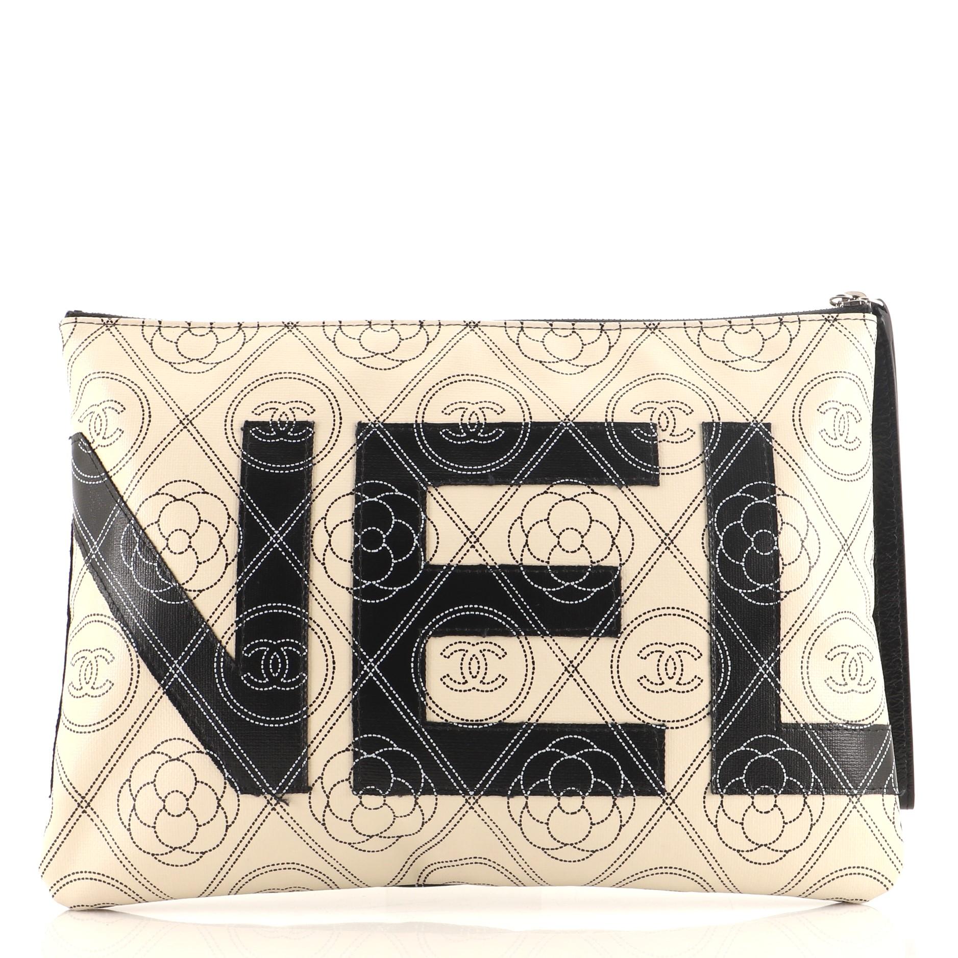 Chanel Camellia Logo Wristlet Clutch Printed Coated Canvas Medium In Good Condition In NY, NY