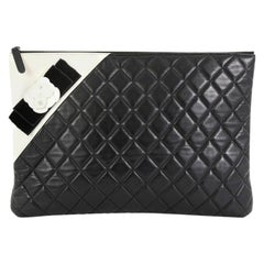 Chanel Camellia O Case Clutch Quilted Lambskin Large Chanel Camellia O Case Clutch Quilted Lambskin Large