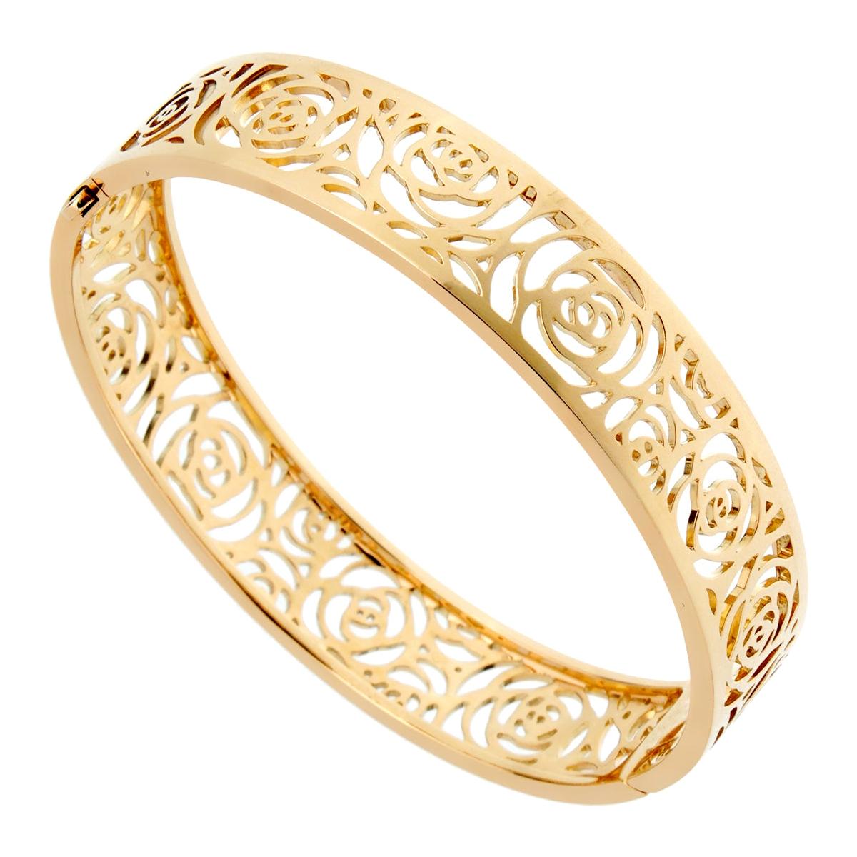 The Camellia, Gabrielle Chanel’s favorite flower, is the inspiration for this exquisite bangle from the Chanel Camellia collection. A polished 18k yellow gold flower motif flows through the entire length of the bangle.

Width: 1/2