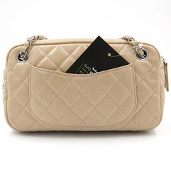CHANEL Sac pour appareil photo en cuir beige