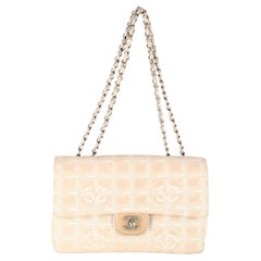 Chanel Canvas Timeless travel line bag.