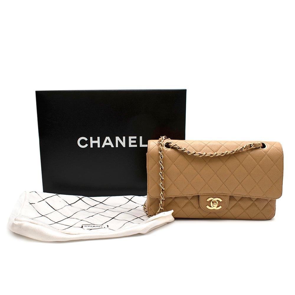 Chanel Caramel Caviar Leather Vintage Quilted Classic Double Flap

- Signature quilted canvas
- 24kt Gold Plated hardware
- Statement woven shoulder straps in beige leather & gold
- Spacious inside with 3 compartments and attached card holder
-