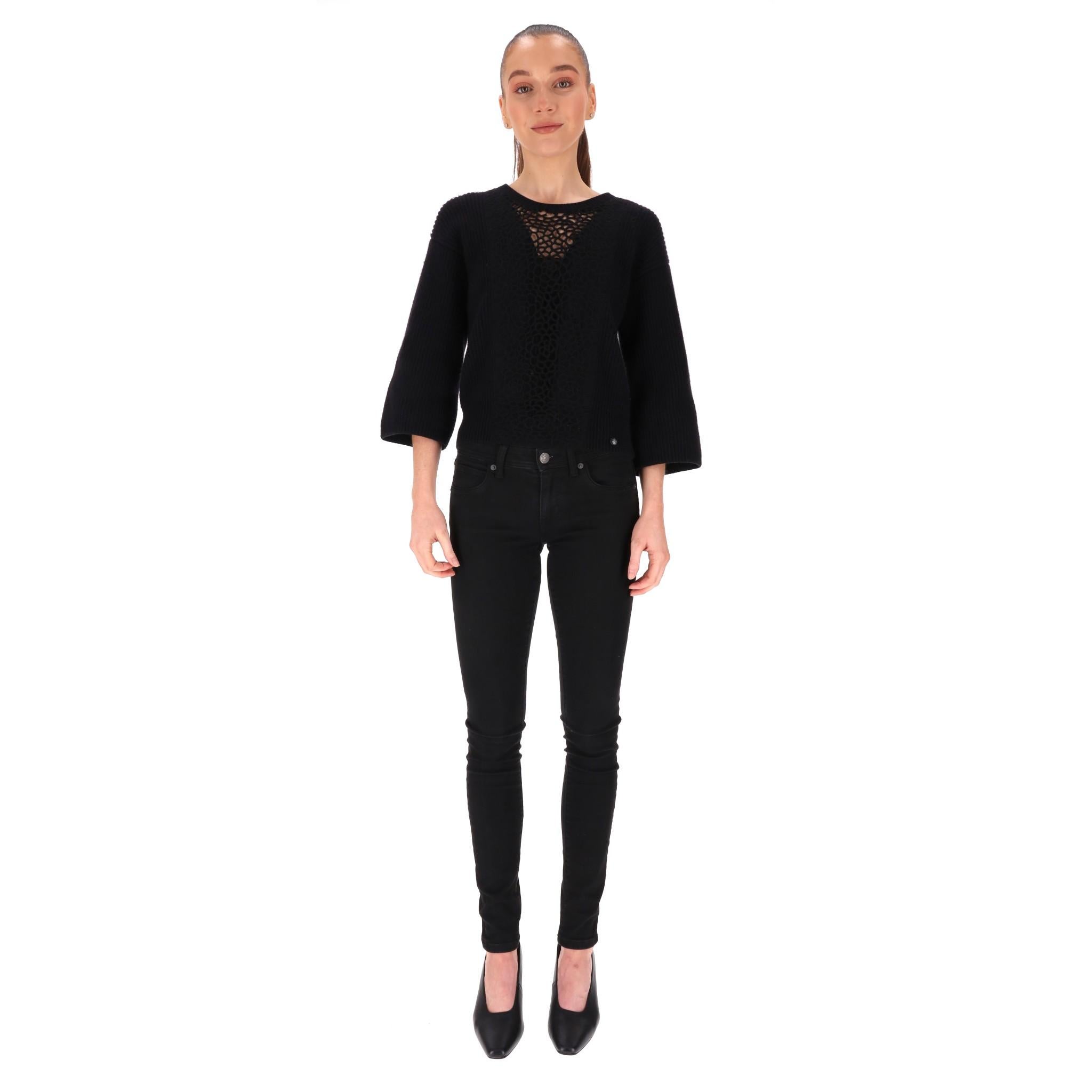 Chanel Cashmere Camellia Flower Design Top/Jumper

Black jumper with lace embroidery Camellia flower, see-through design to the chest.

Round neckline, three-quarter wide sleeves and 'Lion Head' medallion to the side.

Rrp Approx. £2,800

Size -