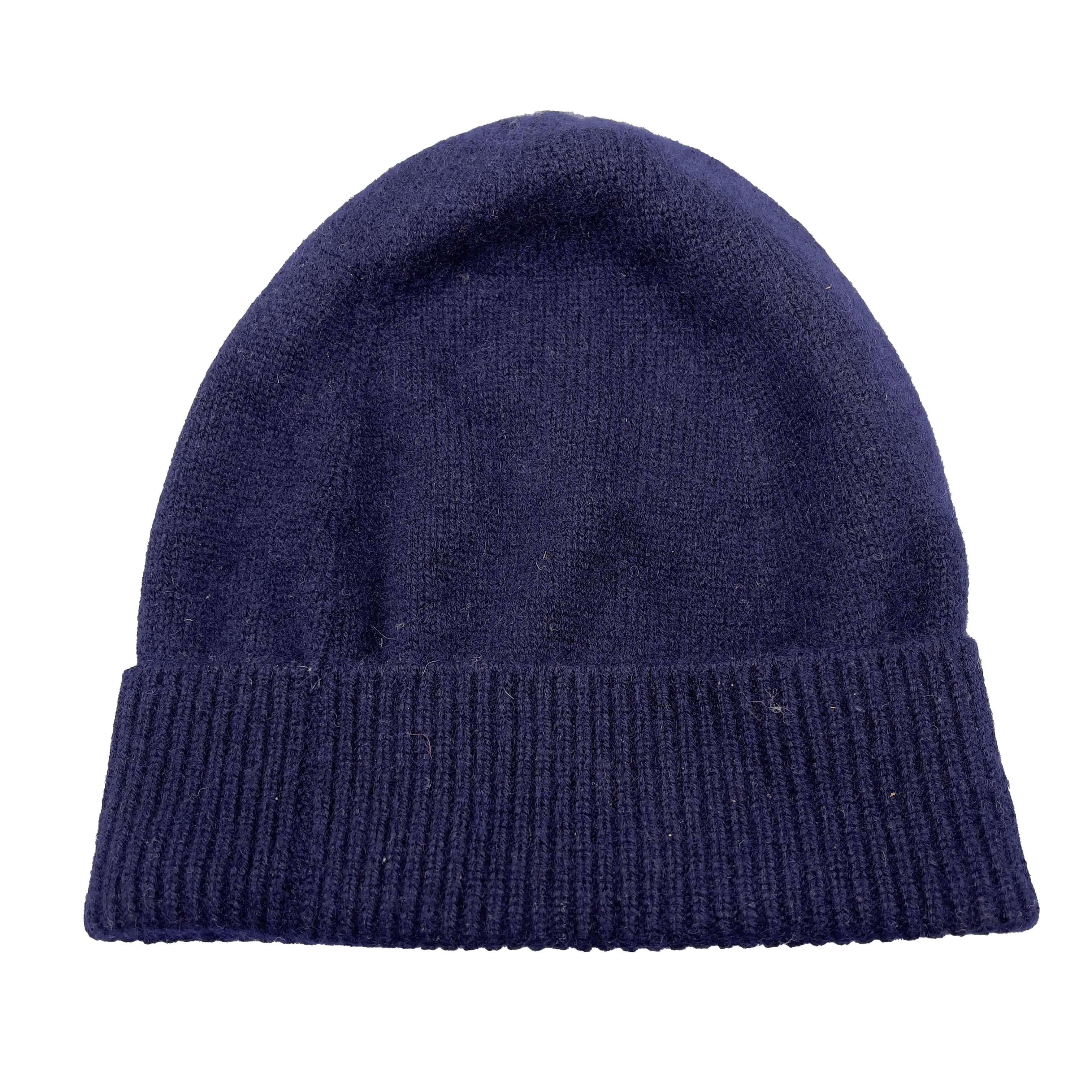 CHANEL - Cashmere CC Logo Beanie - Navy Blue Hat - CC Logo - One Size 

Description

This soft beanie is made of 100% cashmere in navy blue.
Chanel Paris CC logo button at front.
Ribbed fold up hem.

Measurements

Inner Circumference: 21 in / 53.34