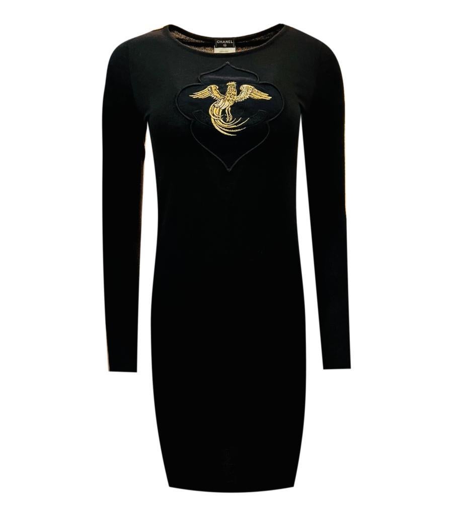 Chanel Cashmere Dress with 'CC' Logo & Embroidered Phoenix

Rare Item - From 2009 collection, black dress in cashmere with large 

'CC' logo and a gold embroidered Phoenix bird to the chest.

Size - 36FR - Oversized Fit

Condition - Good (Small mend