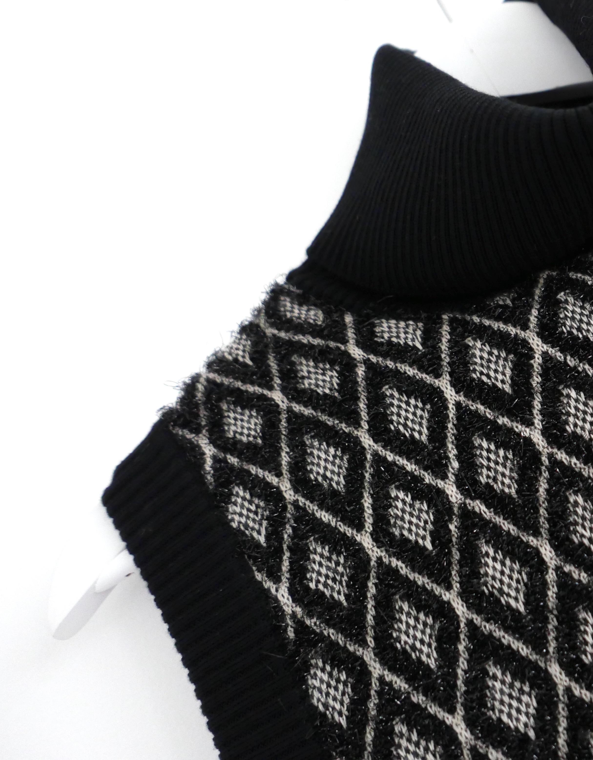 Noir Pull sans manches Chanel automne 2015 (15K) en vente