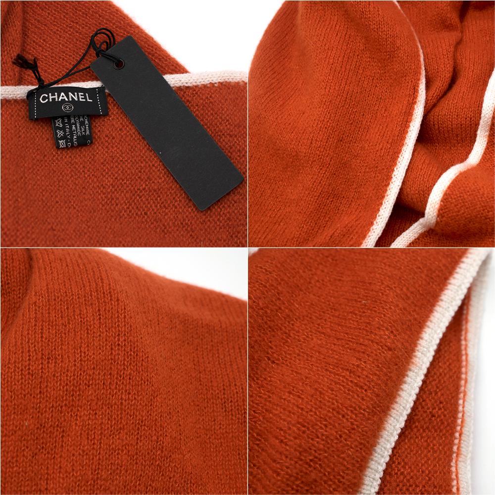 Chanel Cashmere & wool orange hat, scarf, gloves set 

-Orange body, white color trimmed
-Soft warm 74% cashmere, 24% silk, 1% polyamide
-Knitted mixed orange and white color Chanel logo on it 
-Scarf: Wide long length with tag 
-Hat: Beanie style