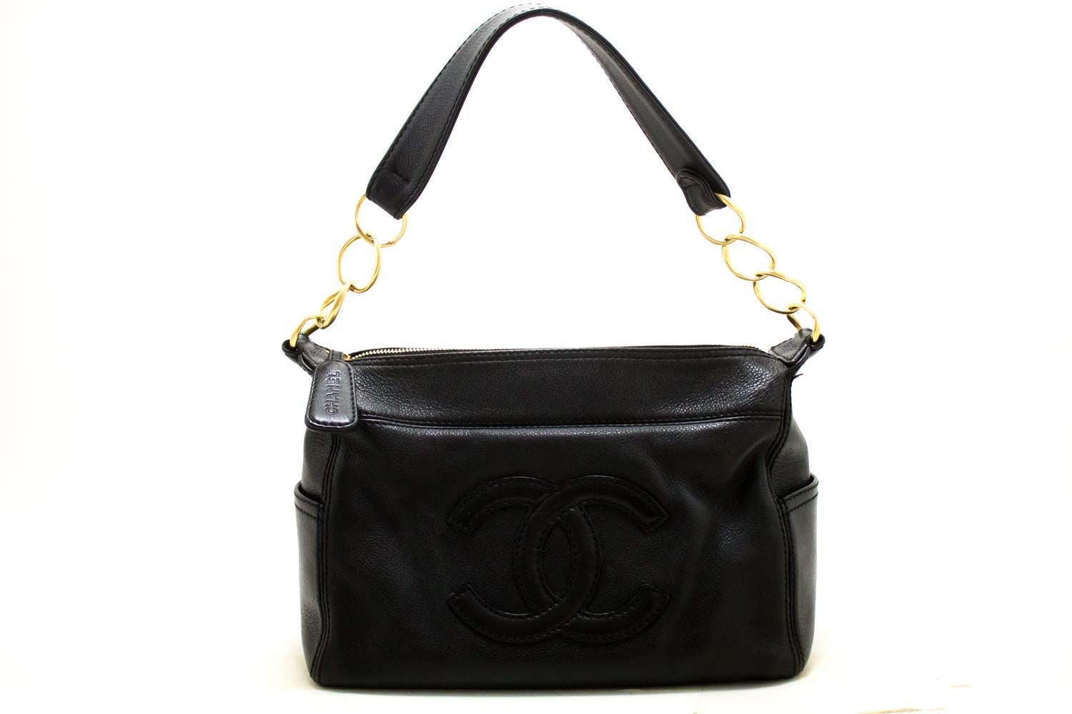 An authentic CHANEL Caviar Chain Shoulder Bag Black Leather Gold Zipper. The color is Black. The outside material is Leather. The pattern is Solid. This item is Contemporary. The year of manufacture would be 2004.
Conditions & Ratings
Outside