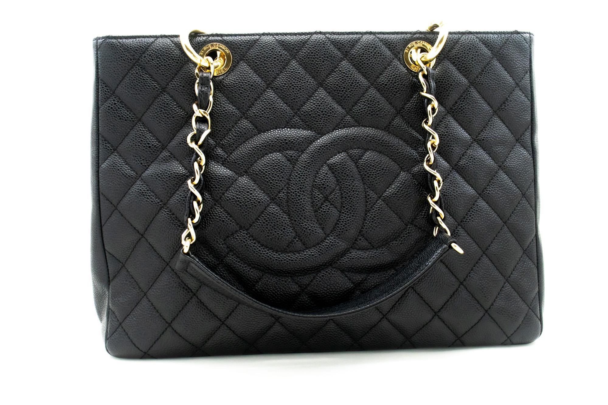 An authentic CHANEL Caviar GST 13