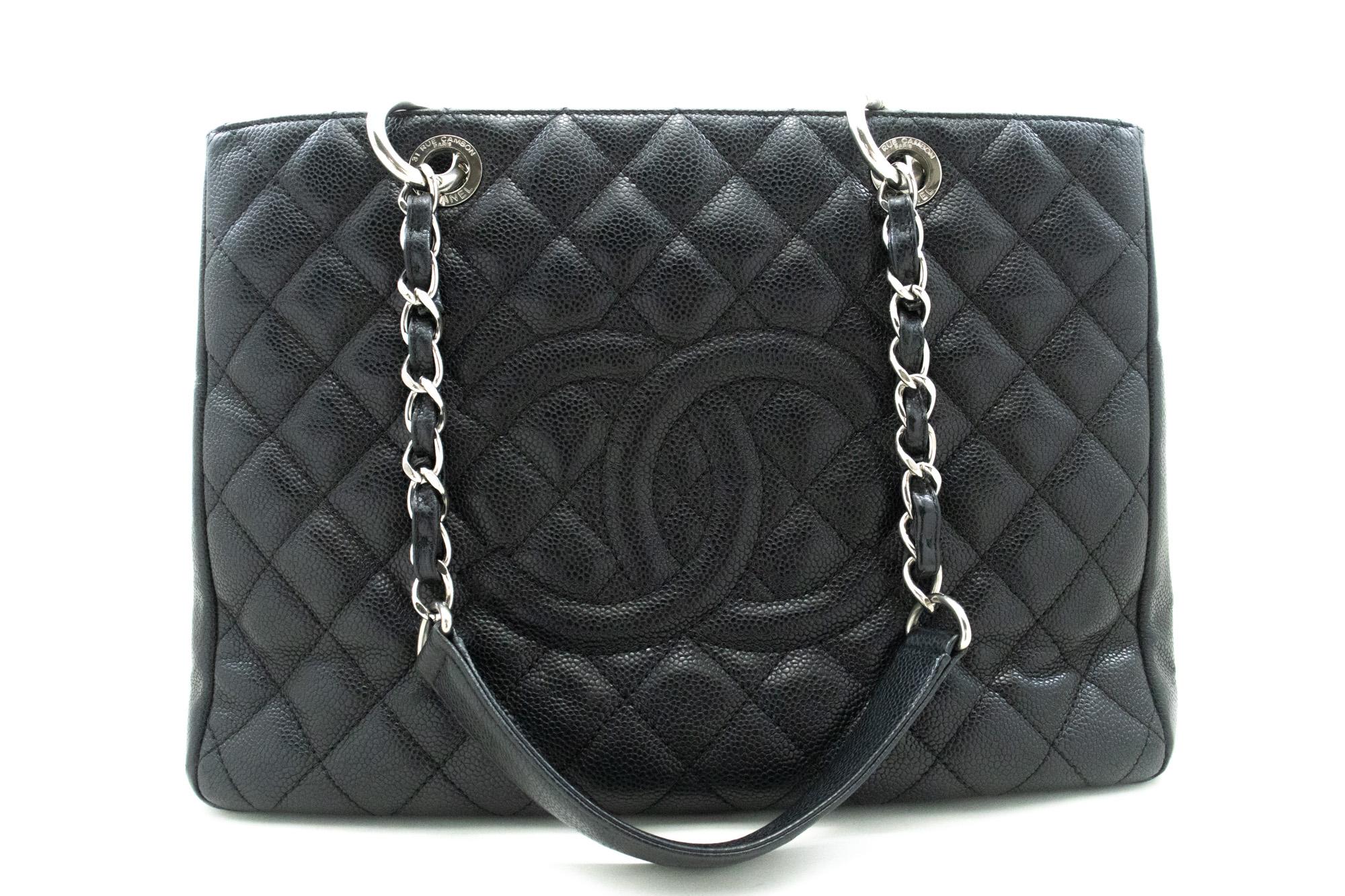 An authentic CHANEL Caviar GST 13