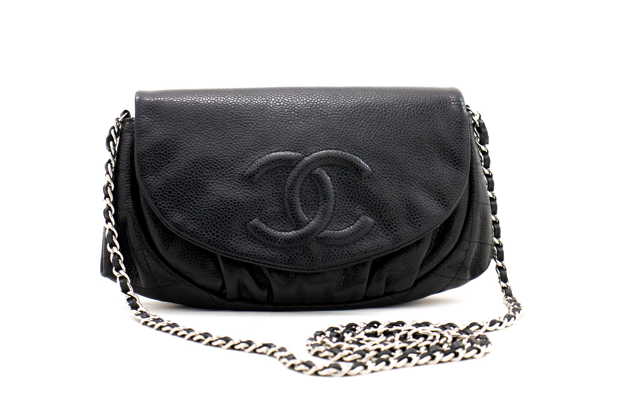 An authentic CHANEL Caviar Half Moon WOC Black Wallet On Chain Shoulder Bag. The color is Black. The outside material is Leather. The pattern is Solid. This item is Contemporary. The year of manufacture would be 2012.
Conditions & Ratings
Outside