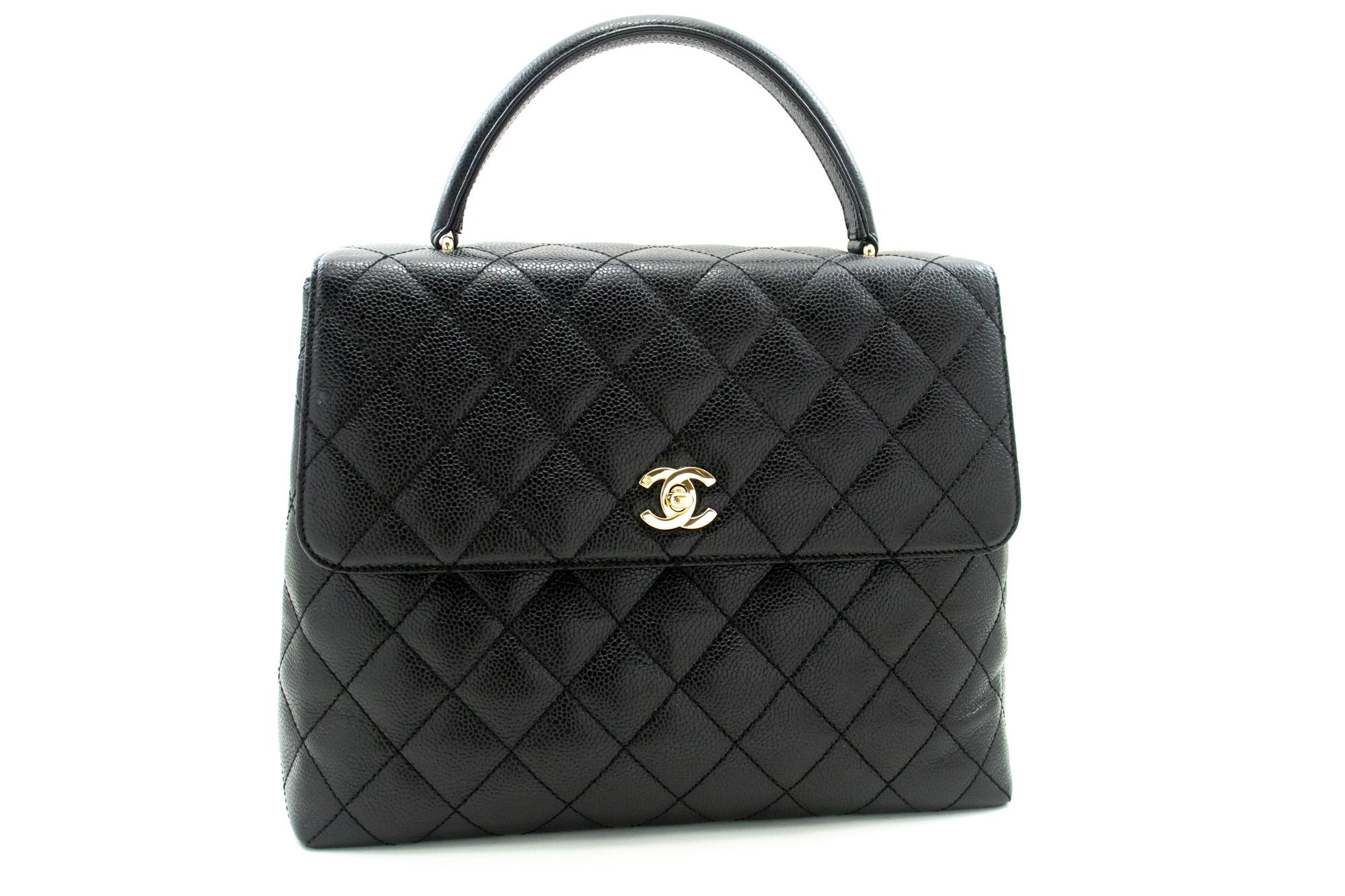 An authentic CHANEL Caviar Handbag Top Handle Bag Kelly Black Flap Leather Gold. The color is Black. The outside material is Leather. The pattern is Solid. This item is Vintage / Classic. The year of manufacture would be 2 0 0 2 .
Conditions &
