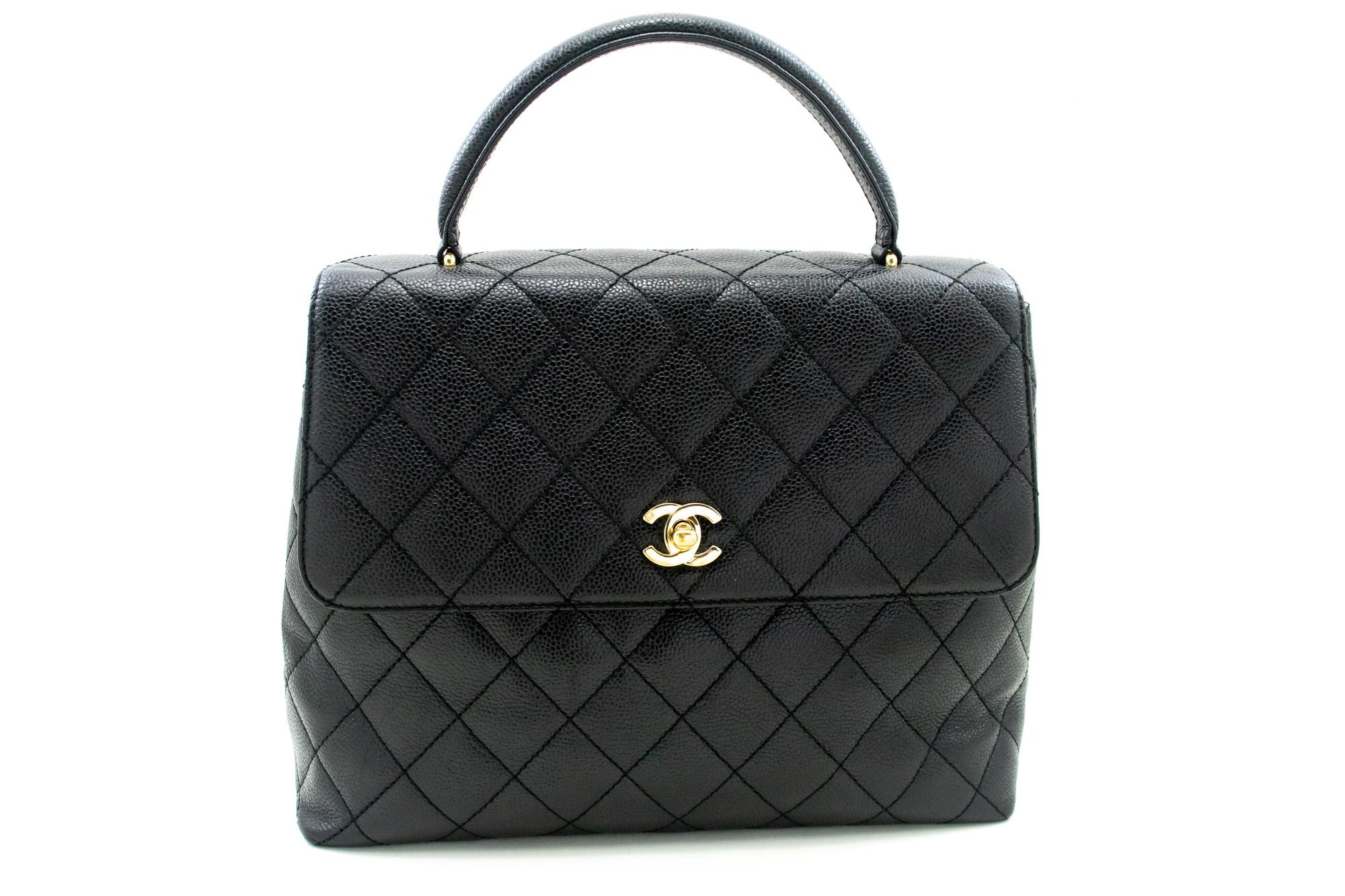 An authentic CHANEL Caviar Handbag Top Handle Bag Kelly Black Flap Leather Gold. The color is Black. The outside material is Leather. The pattern is Solid. This item is Vintage / Classic. The year of manufacture would be 2000-2 0 0 2 .
Conditions &