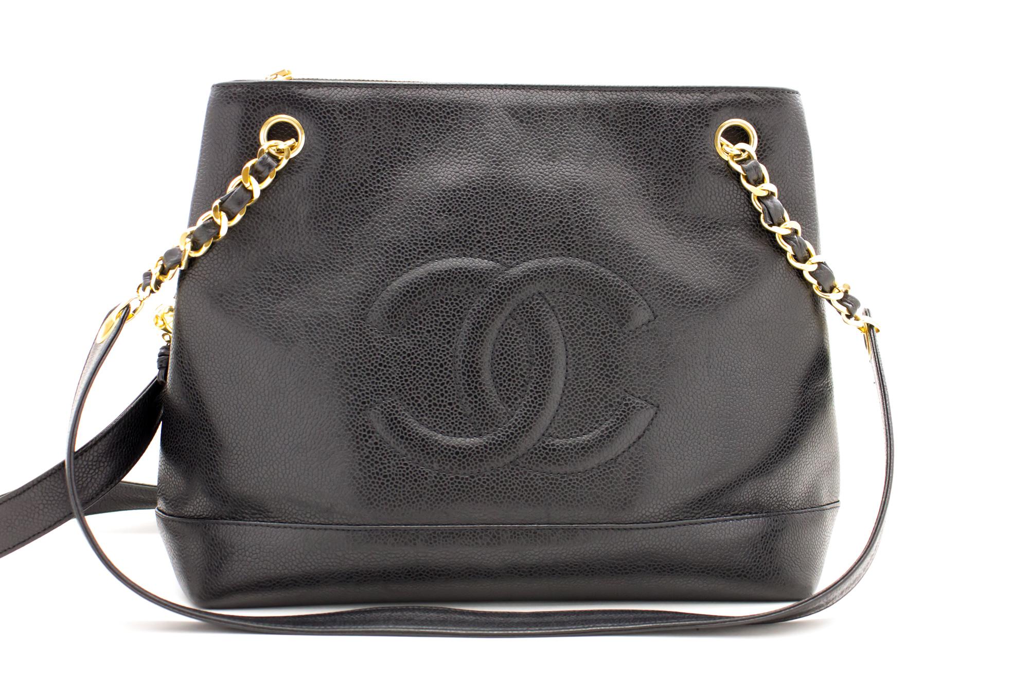 An authentic CHANEL Caviar Large Chain Shoulder Bag Black Leather Gold Zipper. The color is Black. The outside material is Leather. The pattern is Solid. This item is Vintage / Classic. The year of manufacture would be 1991-1994.
Conditions &