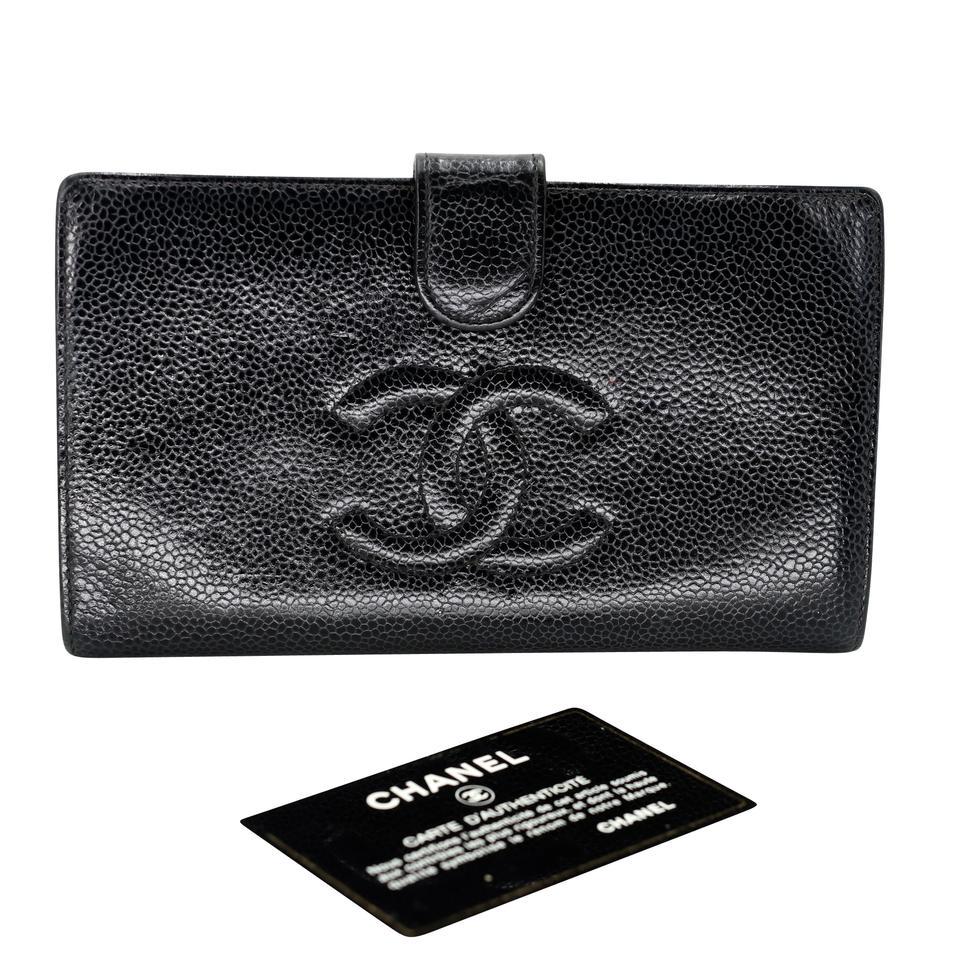 This Chanel Black Leather CC Long French Purse Wallet is perfect if you are seeking something chic and luxurious to organize your essentials such as bills, credit cards and coins. It features gorgeous black leather with a flap snap closure and the