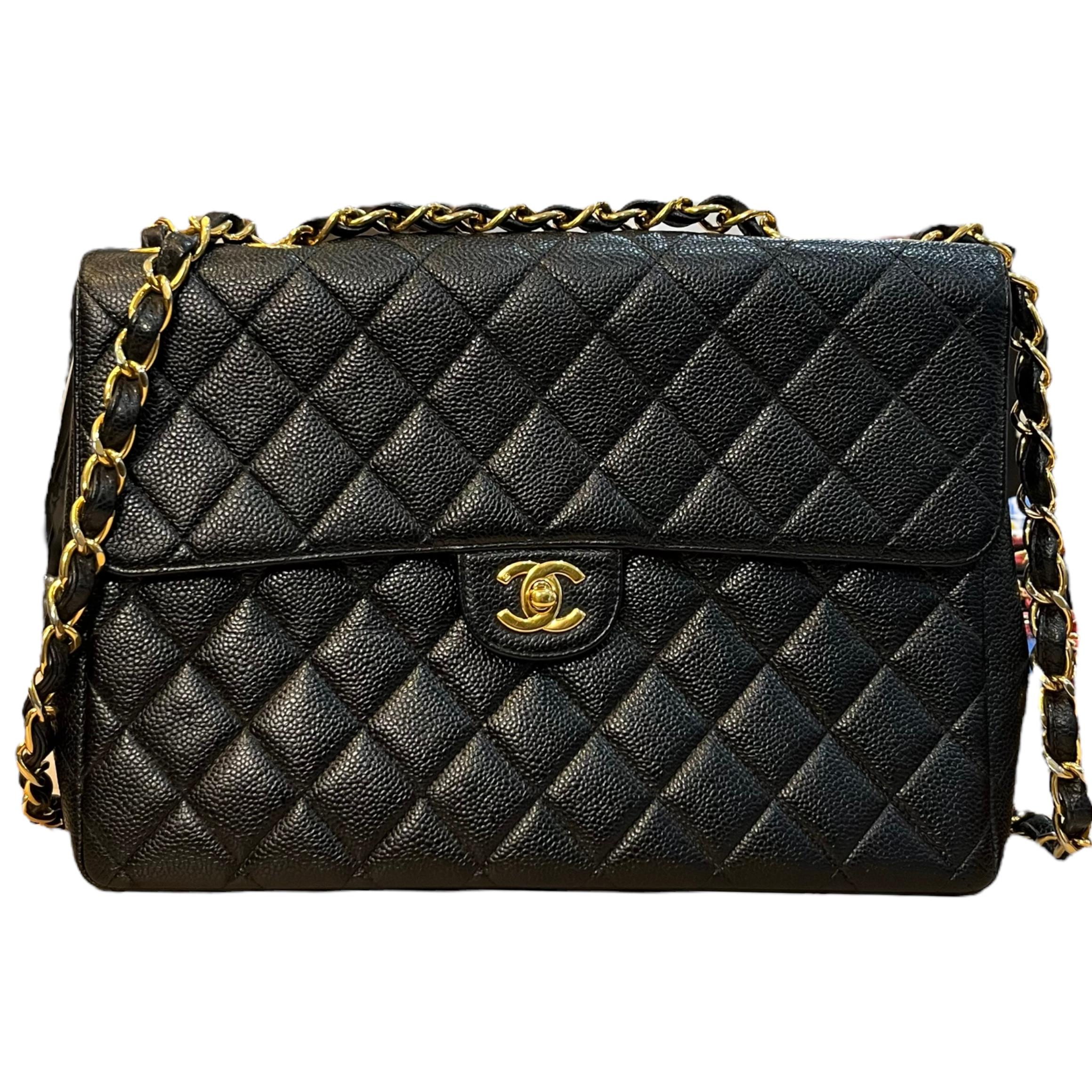 ABSOLUTELY AMAZING CHANEL BAG in Near MINT Condition

CHANEL Caviar Leather Classic Single Flap Jumbo Bag

Made in FRANCE

FEATURES

Black Caviar Quilted Exterior
24k Gold CC Turn Lock Logo
1 Back Mona Lisa Pocket
Black Leather Interior
1 Slip